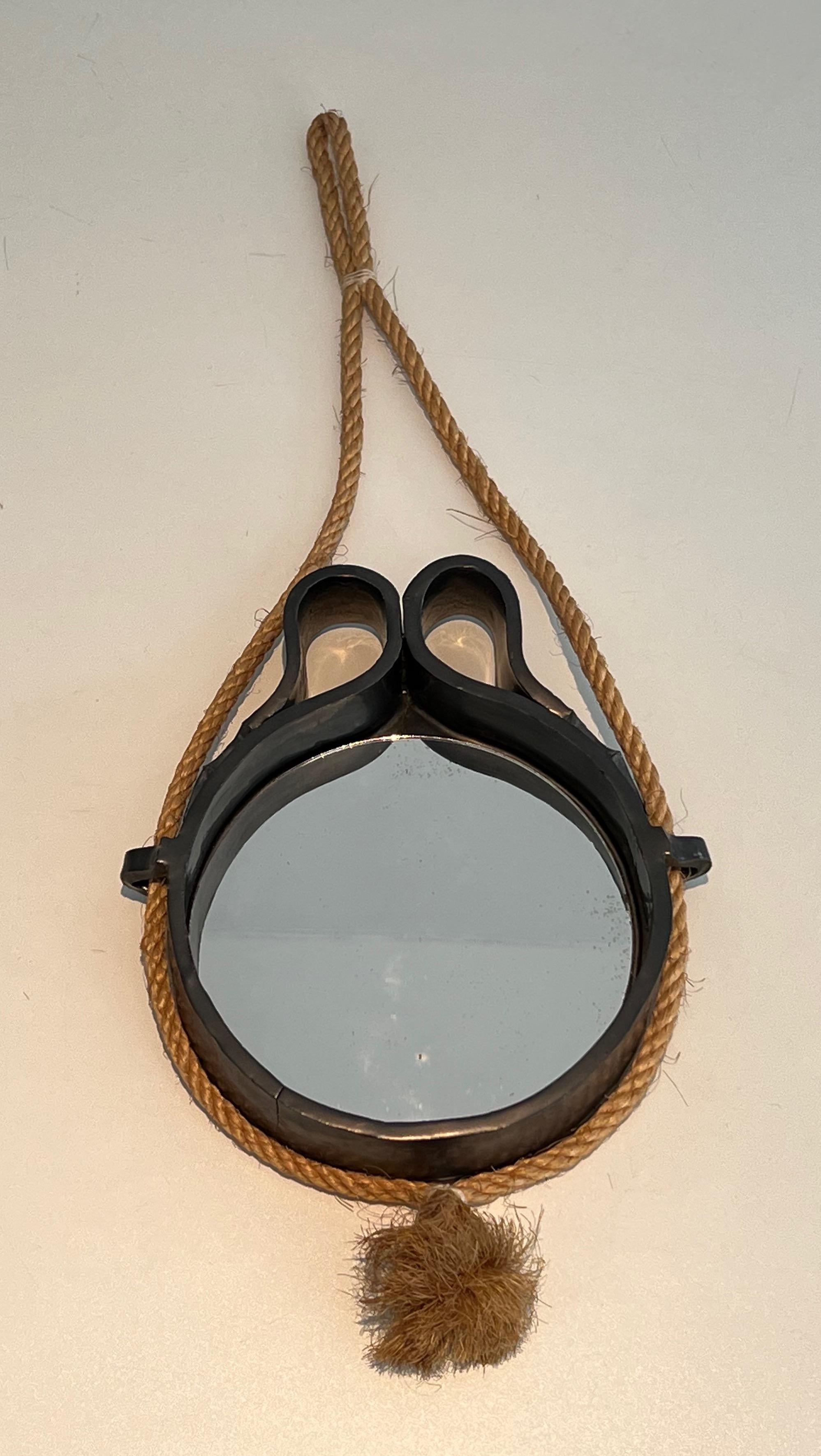 This interesting and unusual small mirror is made of ceramic and rope. There are some cooking fault but it is in good original condition. This is a French work. Circa 1970