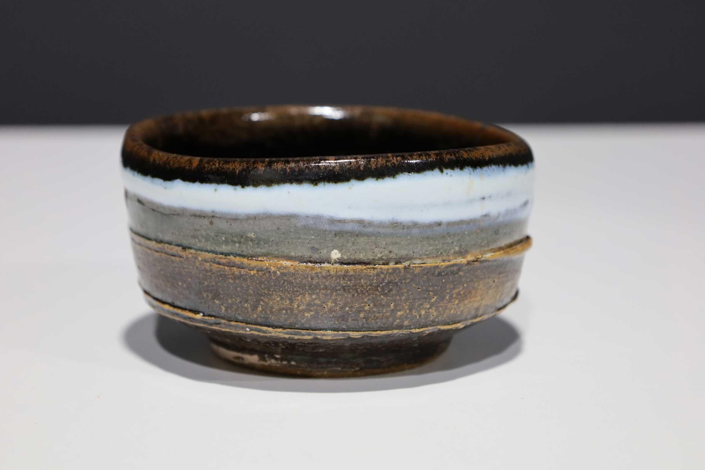 A potter and painter, Albert Green (1914 - 1994) earned an international reputation for his ceramics, stoneware, and canvases. A graduate of the University of Pennsylvania, he studied painting at the Art Students League in New York City, supporting