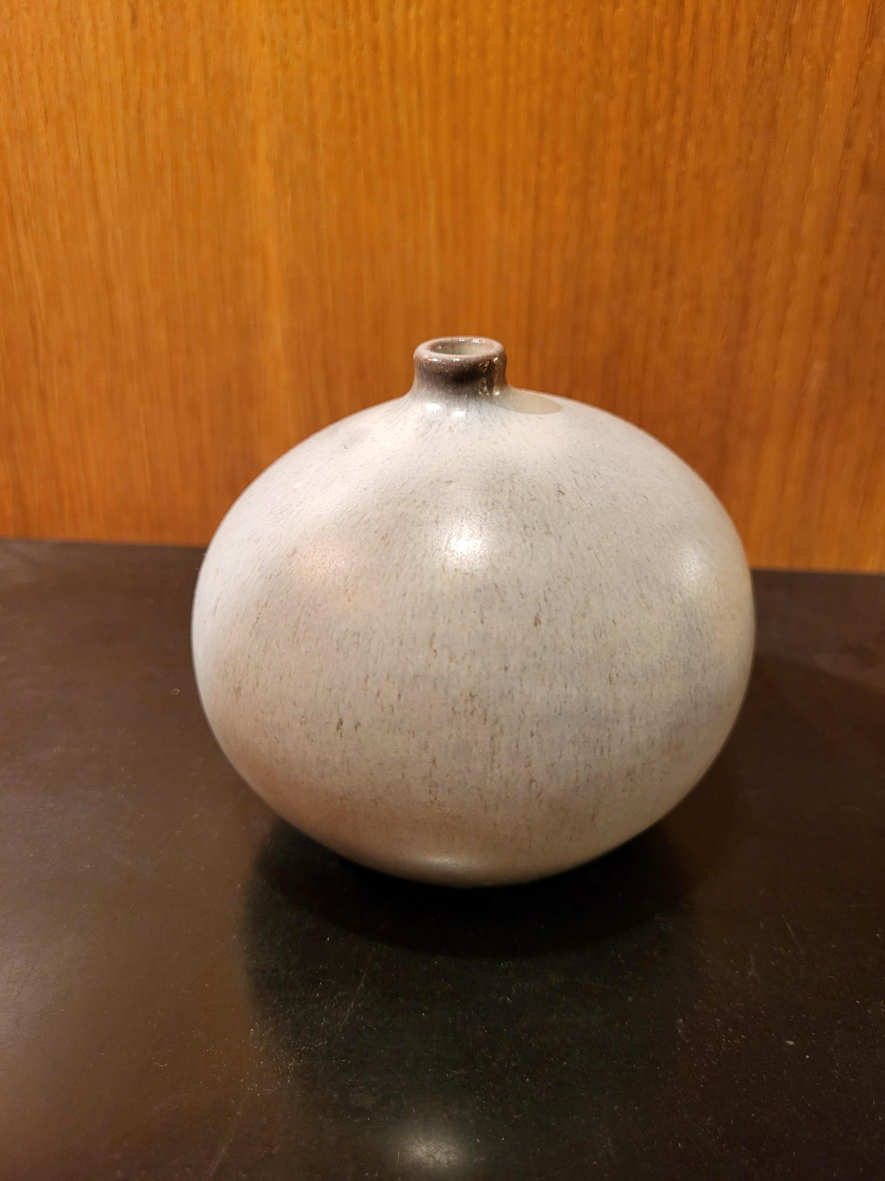 small ceramic round vase by Ruelland, signed