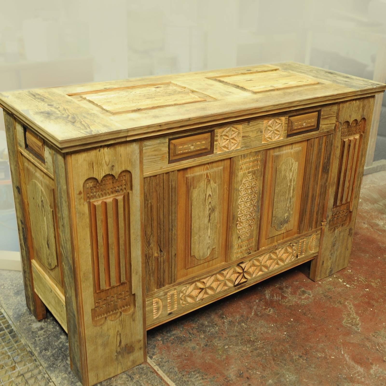 A stunning addition to a modern or rustic decor, this chest is a precious example of Gothic style originated in the French region of Elsass, at the border with Germany. Handmade using 400-600 years old larch, this piece boasts striking traditional