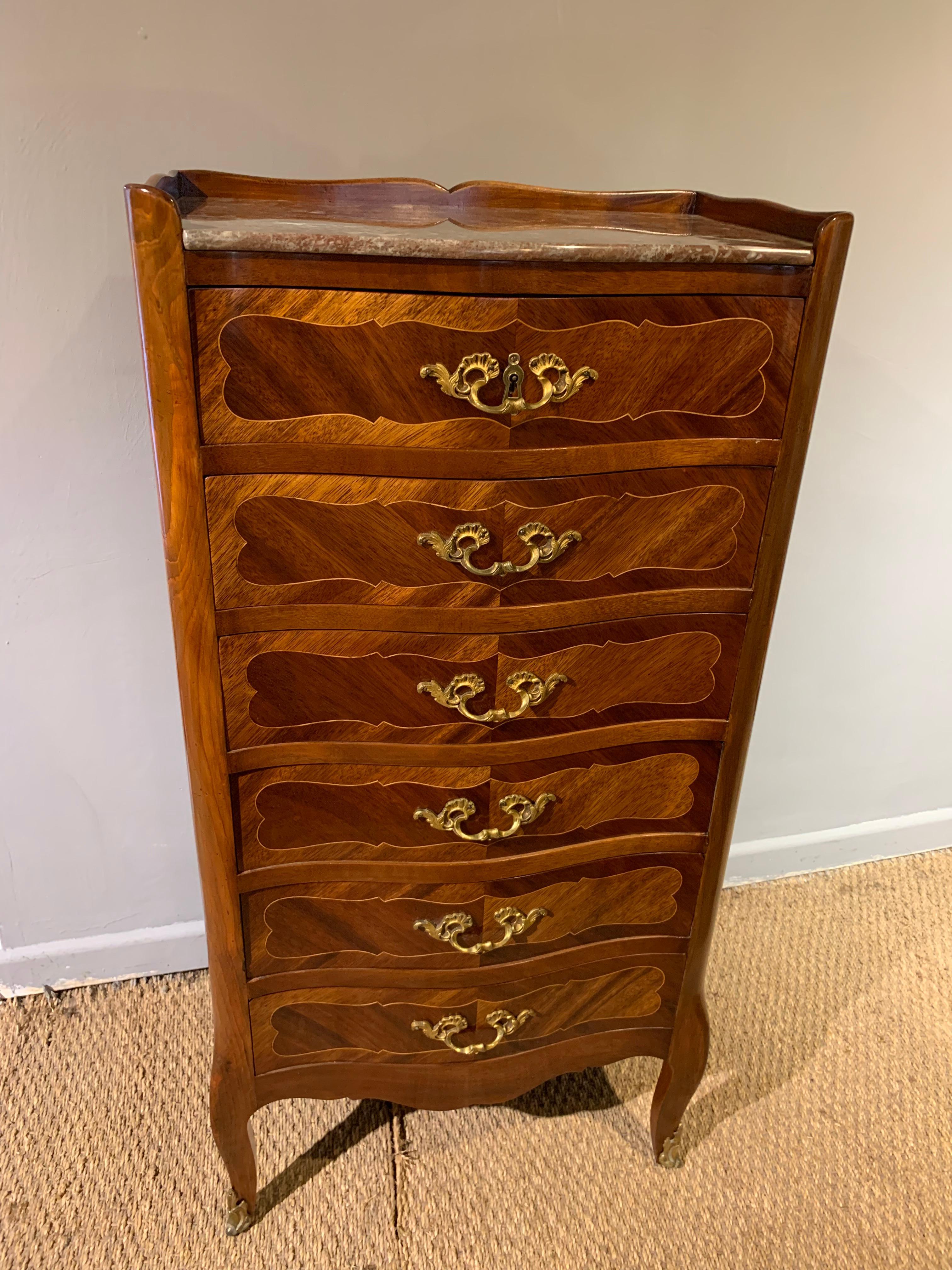 Very charming early 20th century tall and narrow chest of drawers

French dating to circa 1910, with original marble top and ormolu handles

Presented in top showroom condition having been through our workshops cleaned and polished ready to be