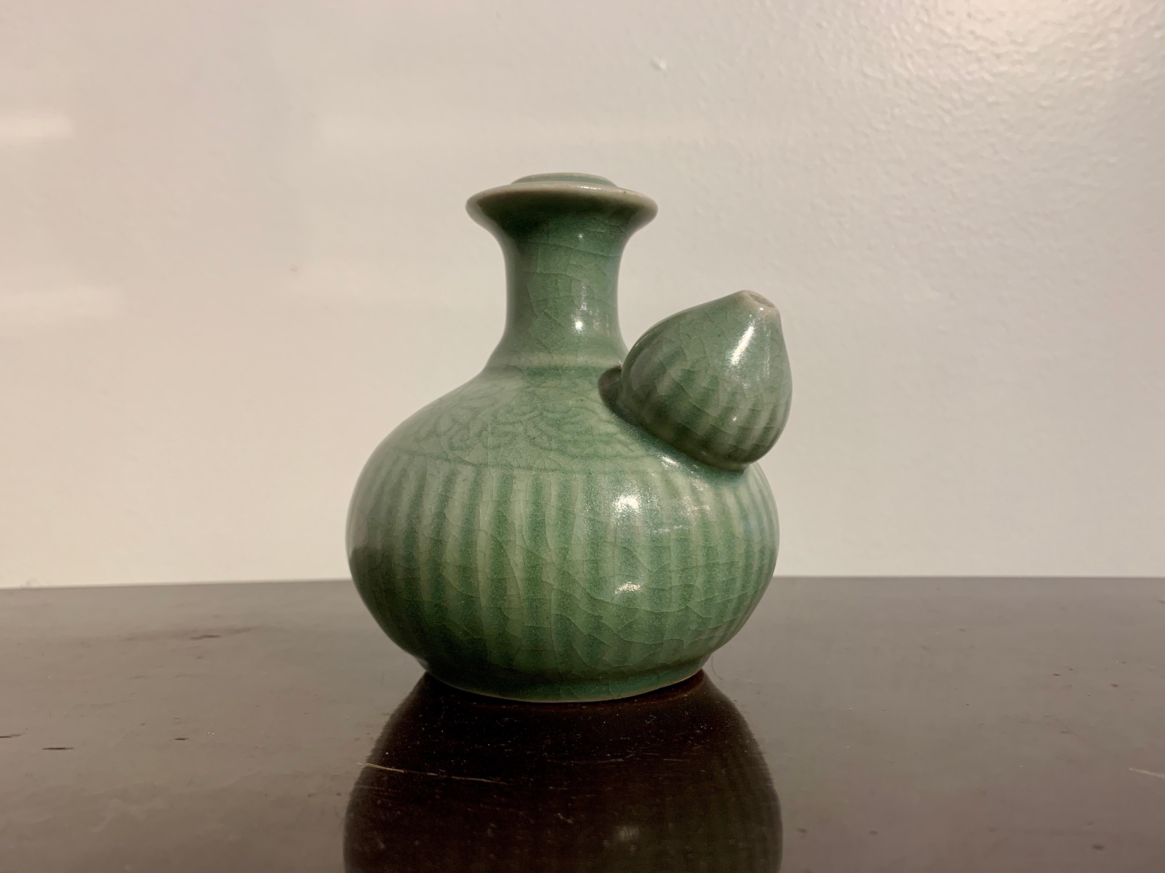Small Chinese Celadon Glazed Porcelain Kendi, Qing Dynasty, 18th Century, China In Good Condition For Sale In Austin, TX