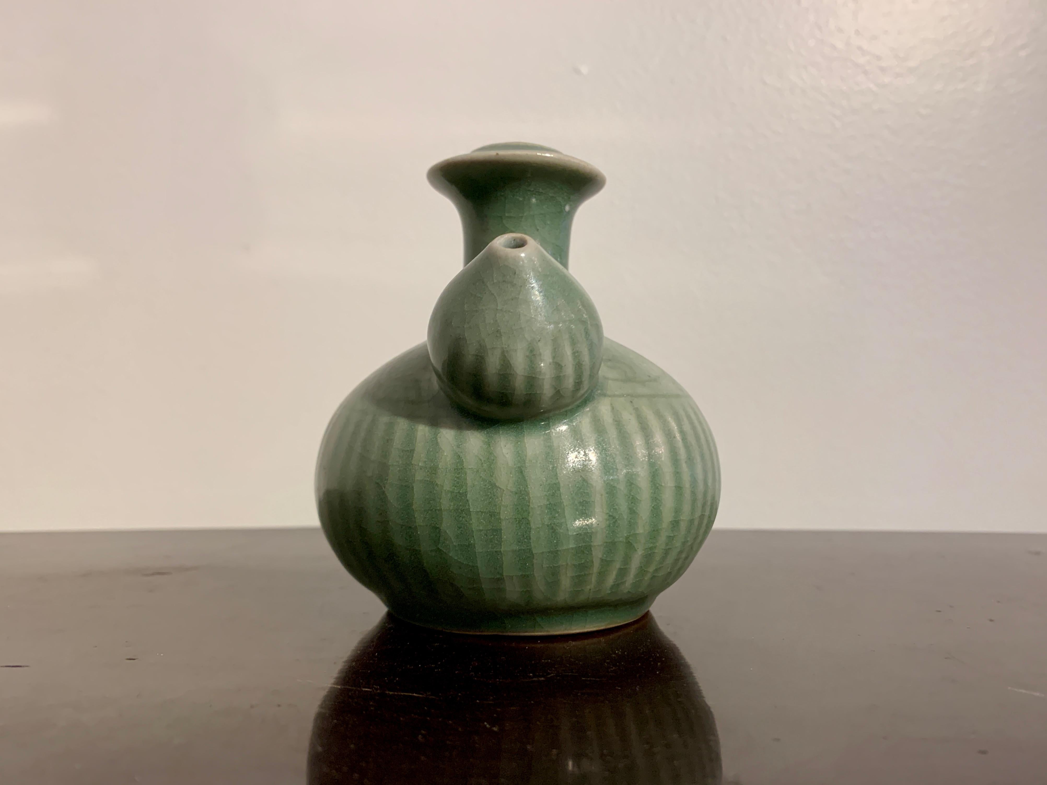 18th Century and Earlier Small Chinese Celadon Glazed Porcelain Kendi, Qing Dynasty, 18th Century, China For Sale