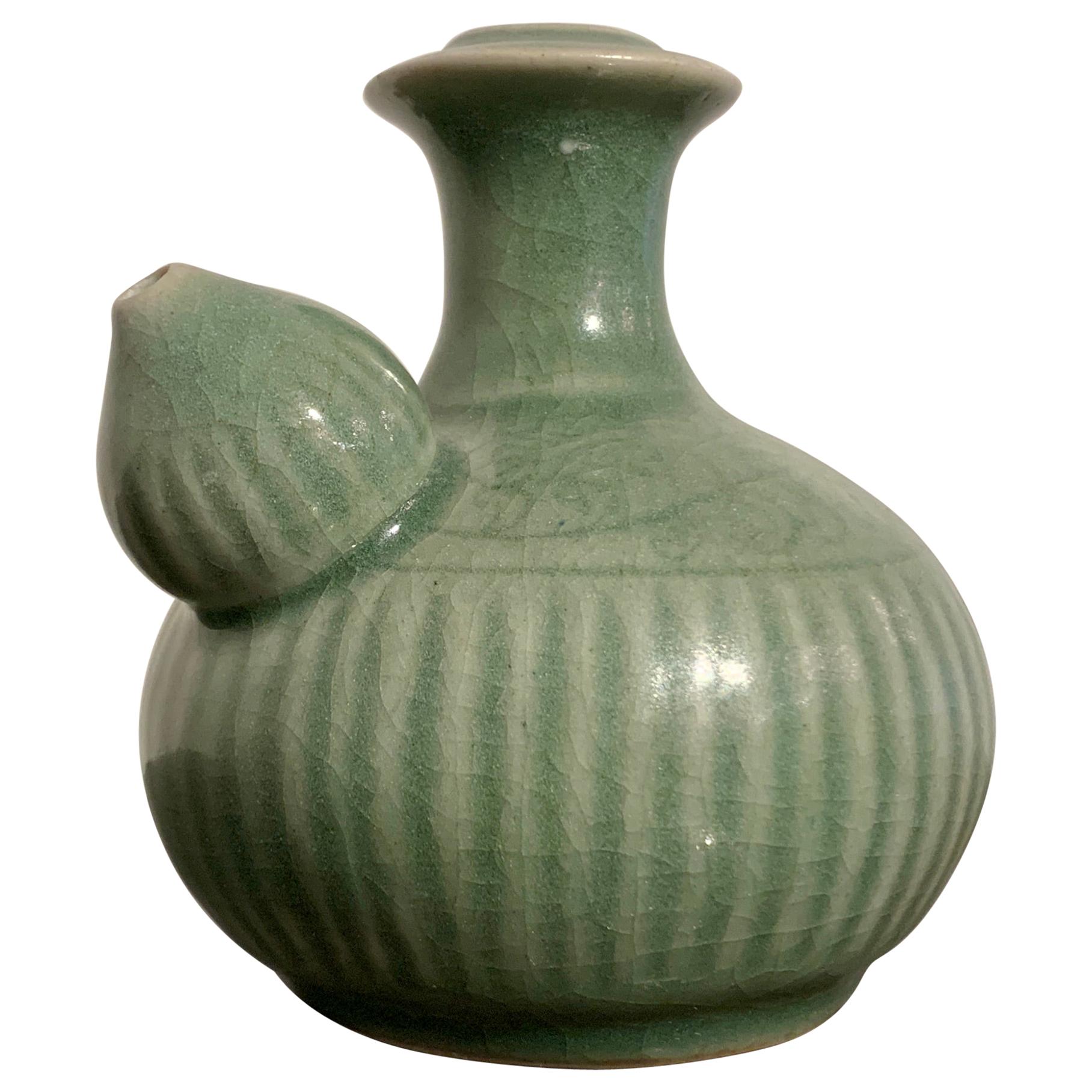 Small Chinese Celadon Glazed Porcelain Kendi, Qing Dynasty, 18th Century, China For Sale