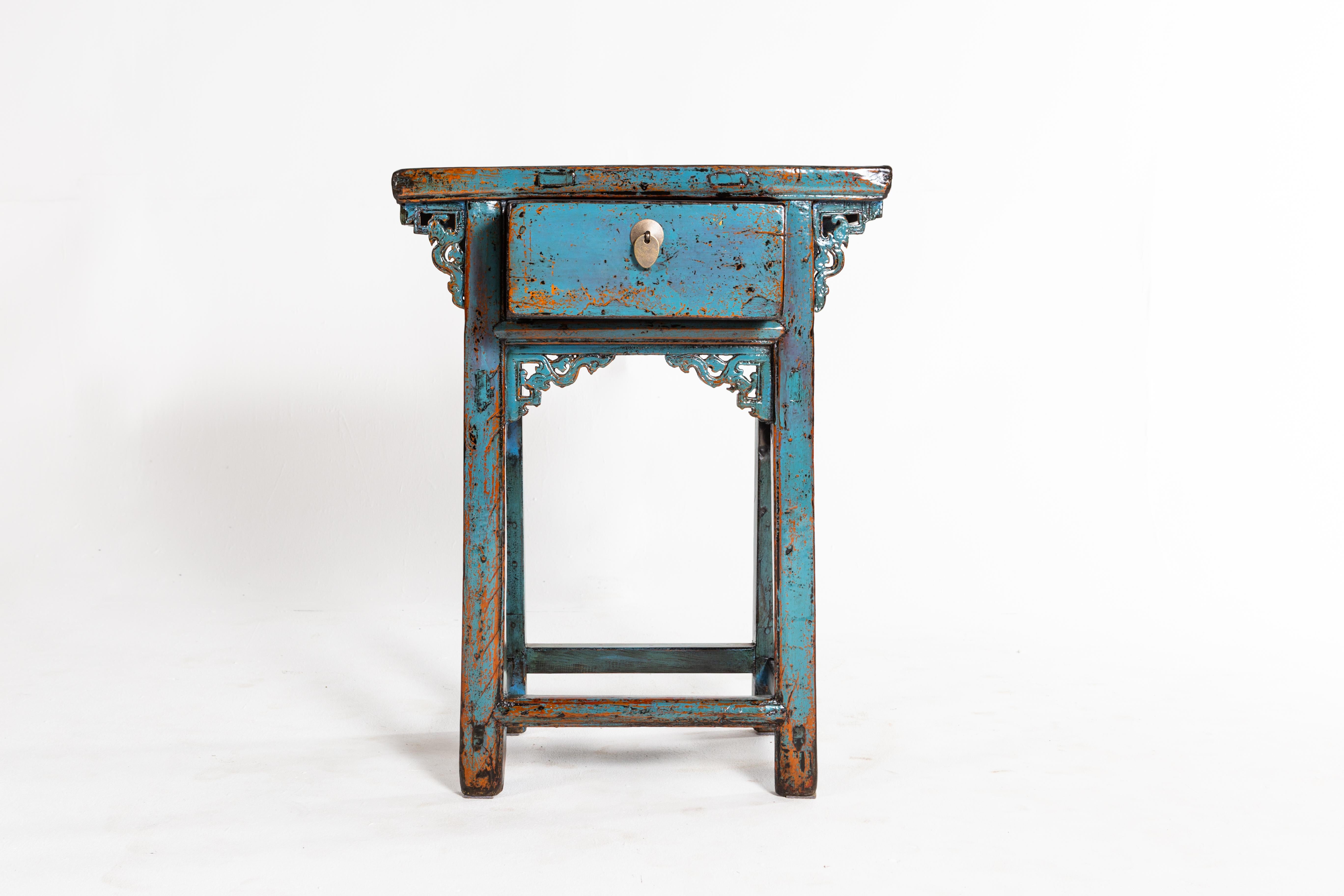 This console table is from Jiang Xu, China and was made from pine wood, circa 1920. The piece features a drawer and blue paint. Wear consistent with age and use.