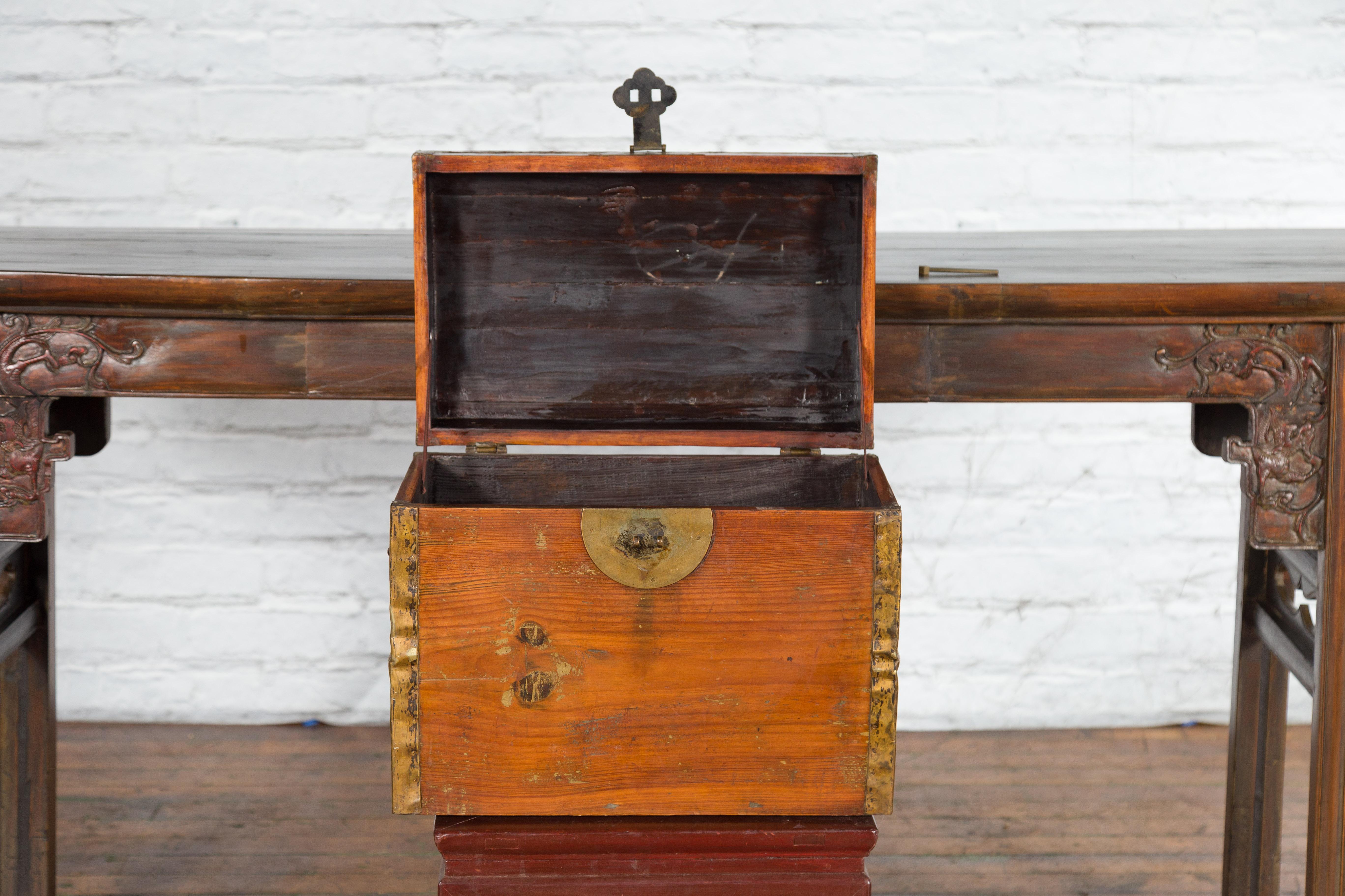 Small Chinese Early 20th Century Wooden Trunk with Domed Lid and Brass Accents 8