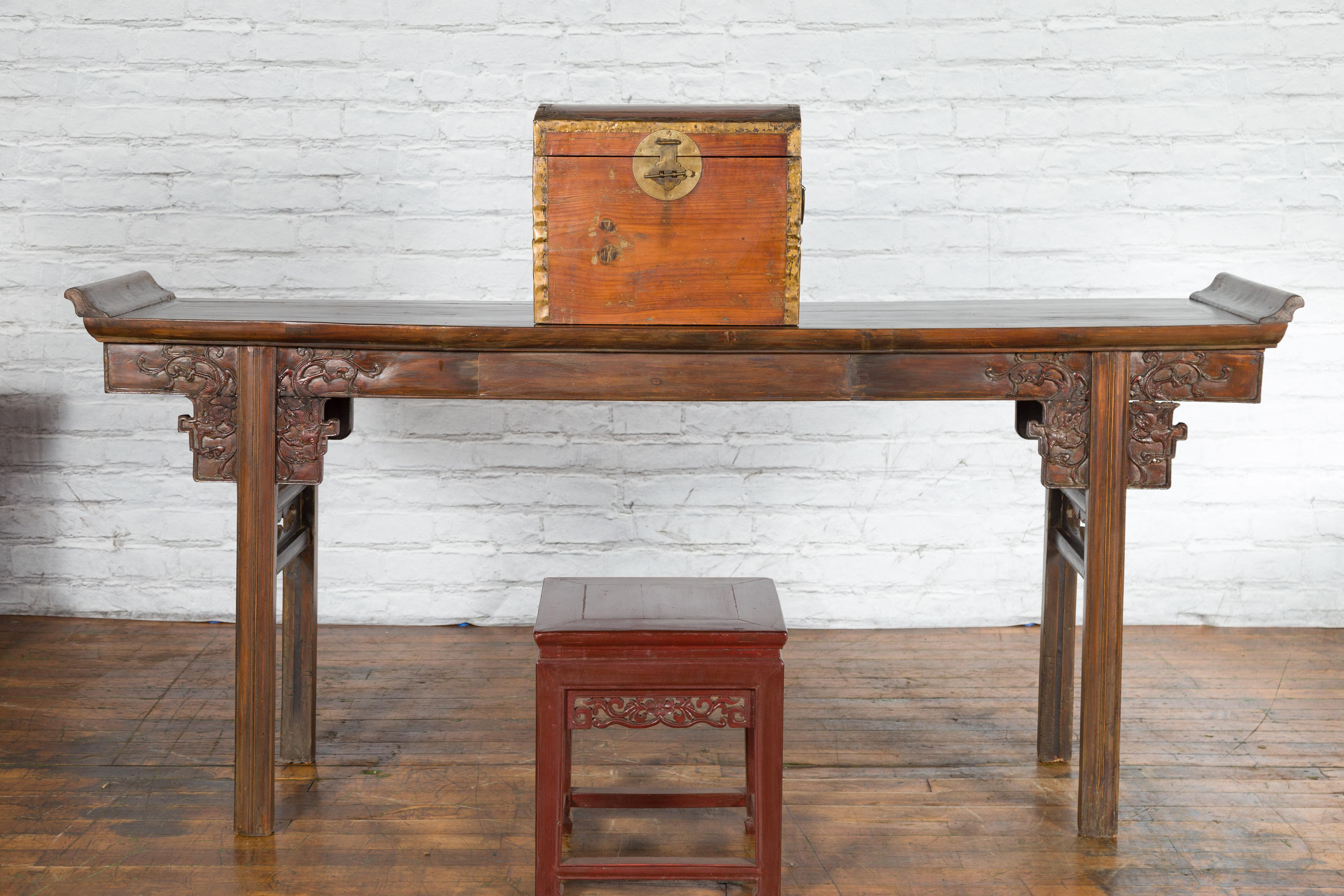Hammered Small Chinese Early 20th Century Wooden Trunk with Domed Lid and Brass Accents