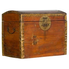 Antique Small Chinese Early 20th Century Wooden Trunk with Domed Lid and Brass Accents