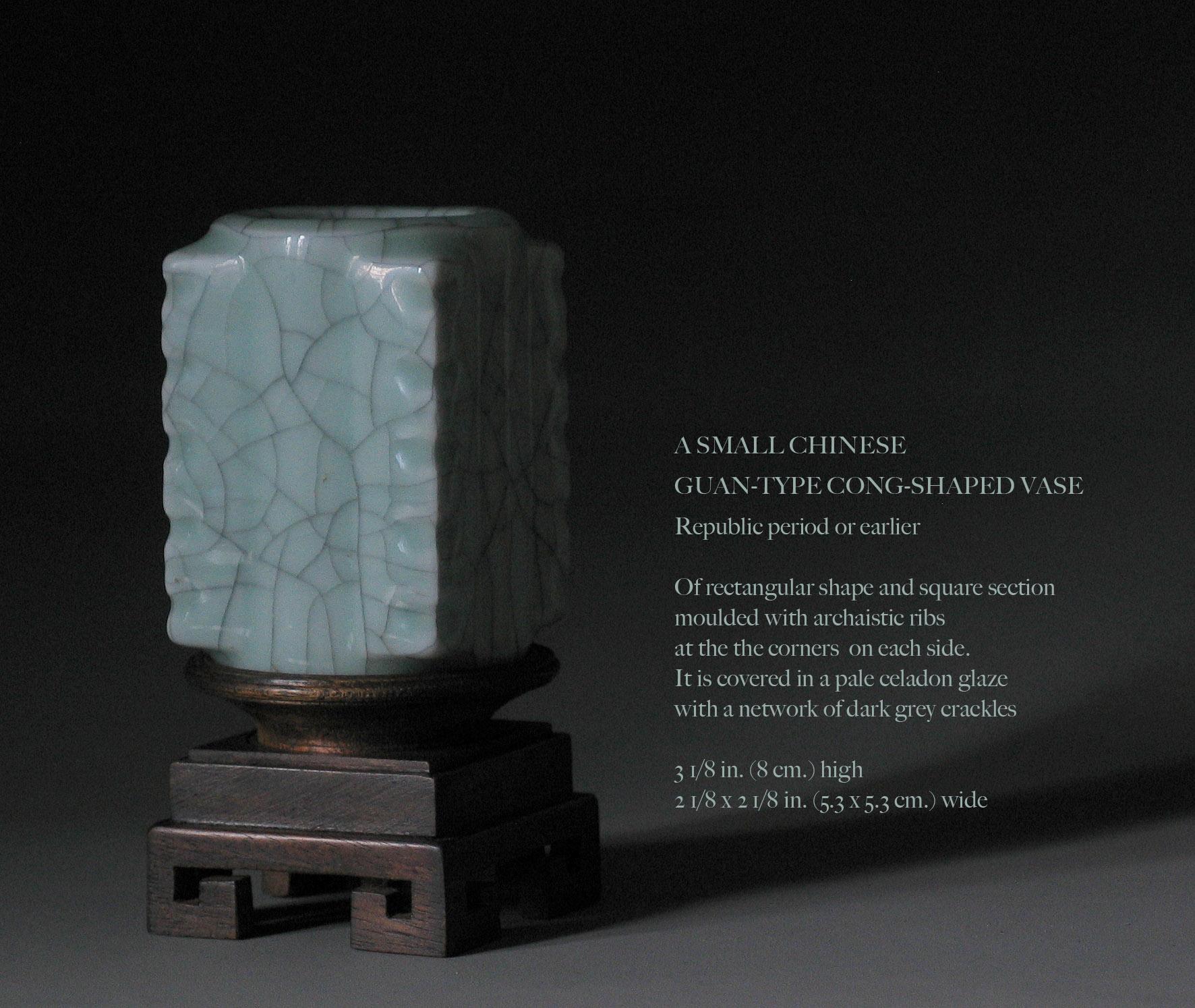 A small Chinese Guan-type Cong shaped vase on stand Republic period or earlier, of rectangular shape and square section molded with archaistic ribs at the corners of each side. It is covered in a pale celadon glaze with a network of dark grey