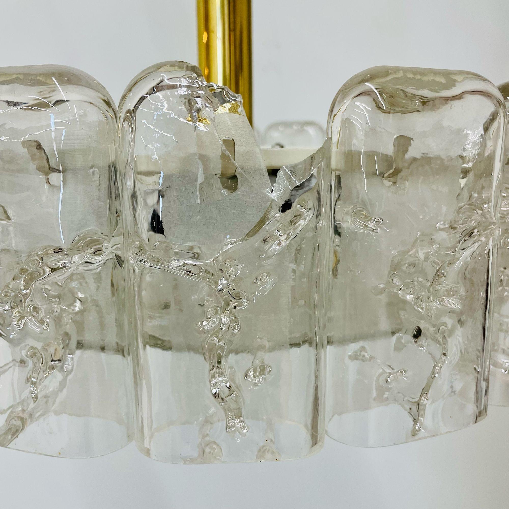 Small Circular German Mid-Century Modern Ice Glass Chandelier / Pendant, 1970s
 
Ice Glass, Brass
Germany, 1970s
By Doria Leuchten Germany
 
22H x 16 Dia.
18 2.5