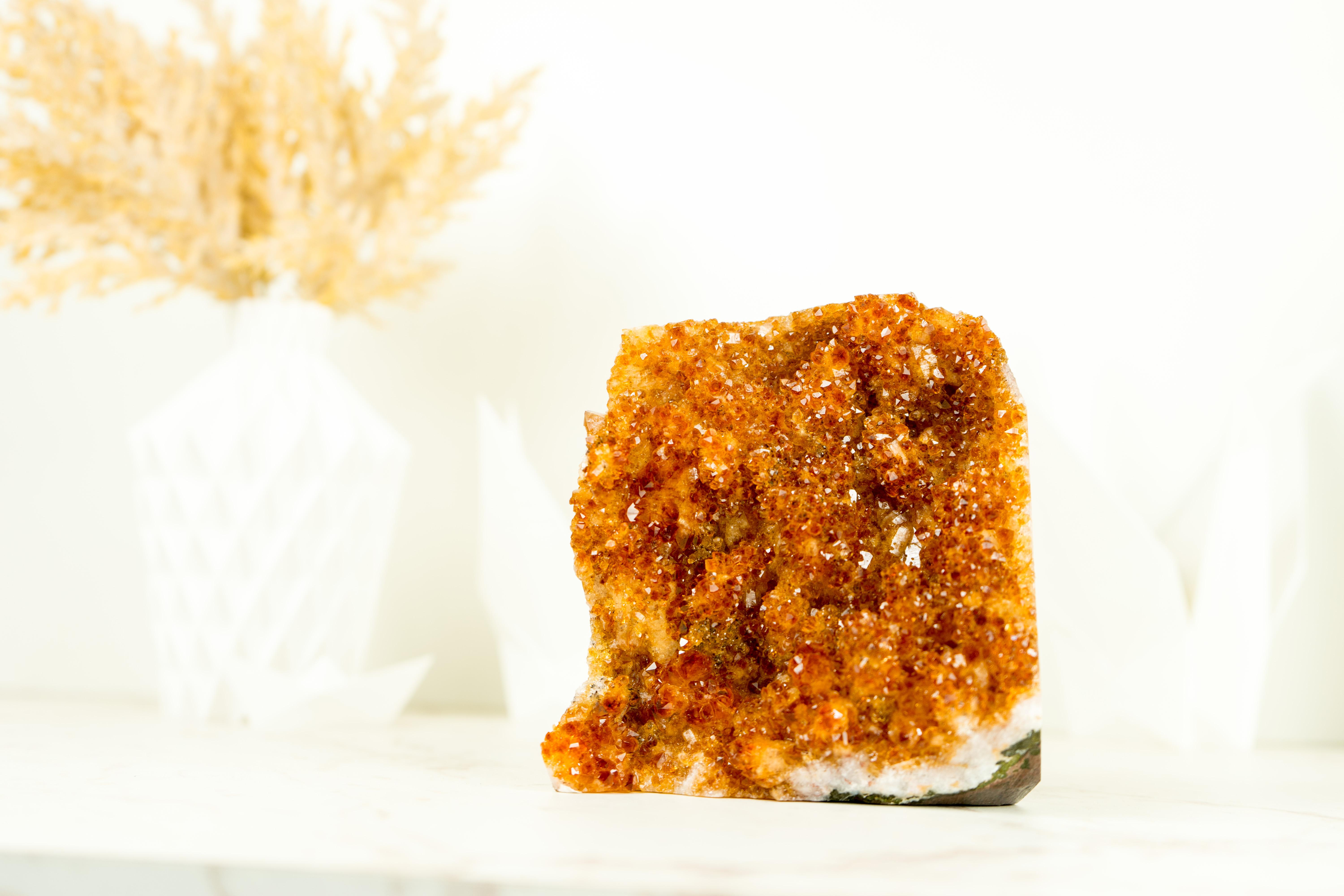 A Rare Citrine Cluster that boasts world-class color tones, beautiful aesthetics, and unique characteristics. This extraordinary crystal promises to be a stunning addition to your office table, home decor, or crystal collection, with its abundance
