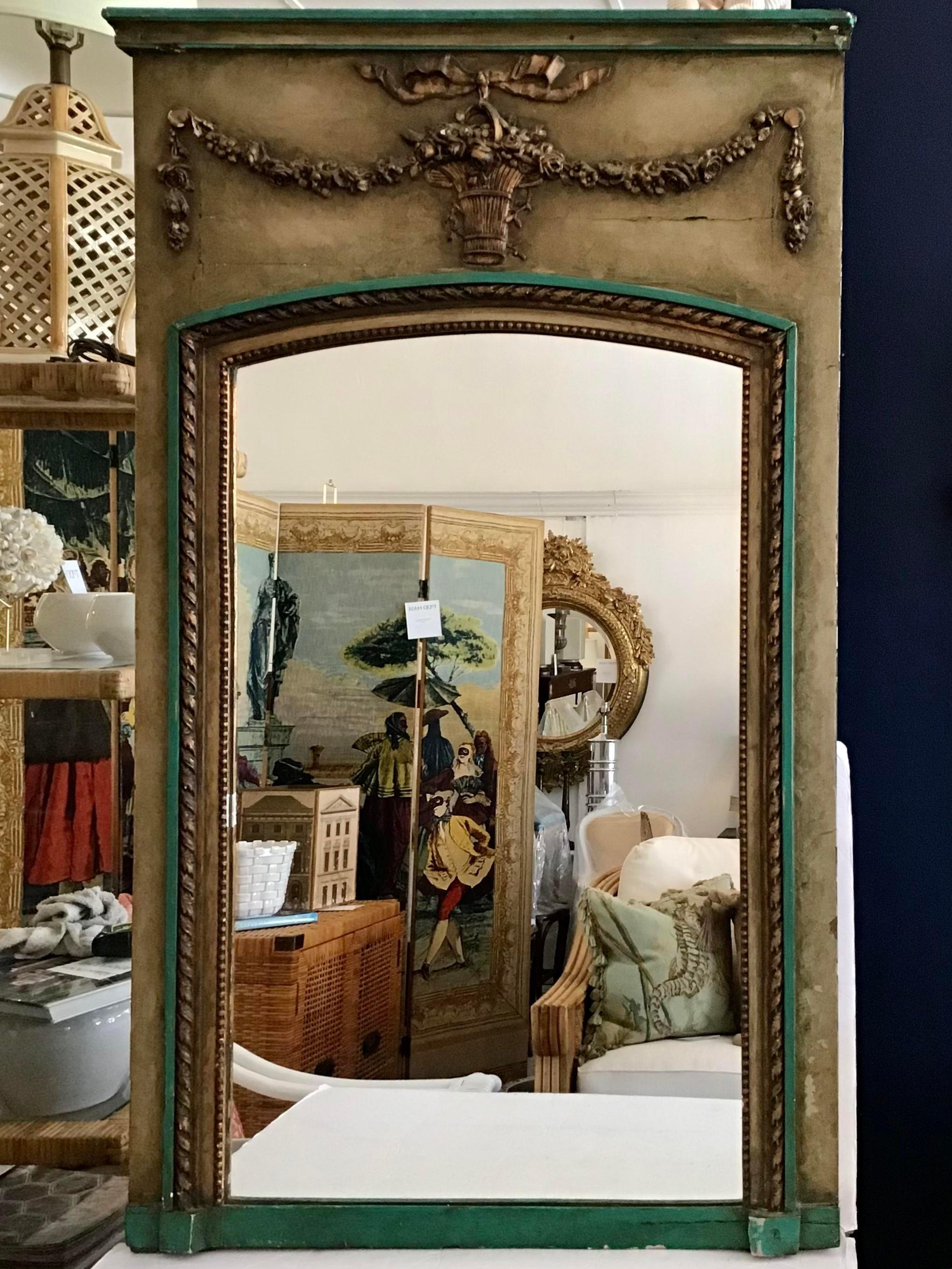 Beautiful small classic French Boiserie mirror with detailed decorated frame to mount on top of a console. Add this mirror to your elegant classic European inspired room. The carving details are fabulous.