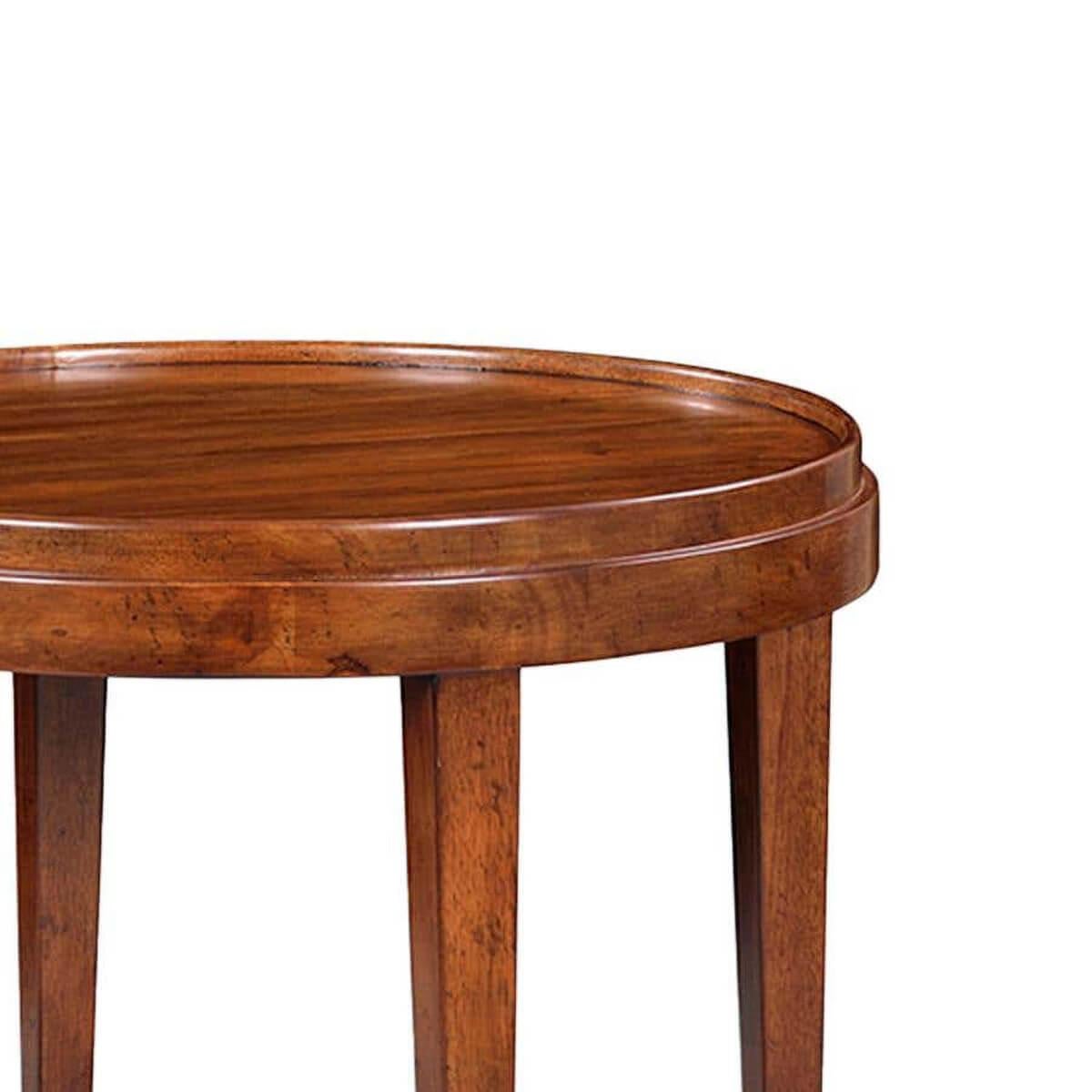 A Classic style round end table with a rustic warm walnut stained finish. The two-tier side table with a wooden galleried dish top, with square tapered legs and a round shelf stretcher base.

Dimensions: 27