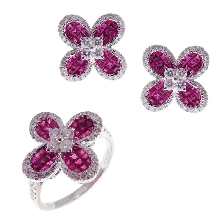 Clover ruby earring and ring set, all with a high polish finish. Available in 18K White Gold. 

Earring Information
Diamond Type : Natural Diamond
Metal : 18K
Metal Color : White Gold
Diamond Carat Weight : 0.66ttcw
Baguette Carat Weight :