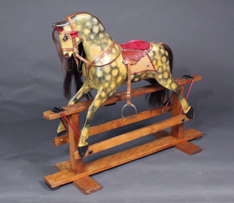 A small Collinson rocking horse made in circa 1950.
The paint is original and has been restored as necessary and the tack is also mainly original; the mane, tail and forelock have been replaced.

Collinson has been making rocking horses since