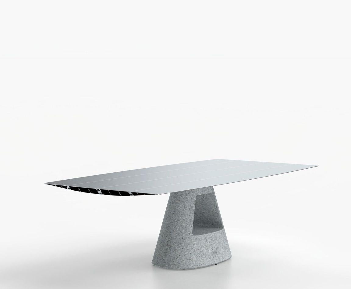 Small Concrete table B by Konstantin Grcic
Dimensions: D 120 x W 240 x H 74 cm 
Materials: Tabletop in extrusions aluminium with open ends cut at 45º. There is the option of the surface being laminated in a natural oak effect with a varnished