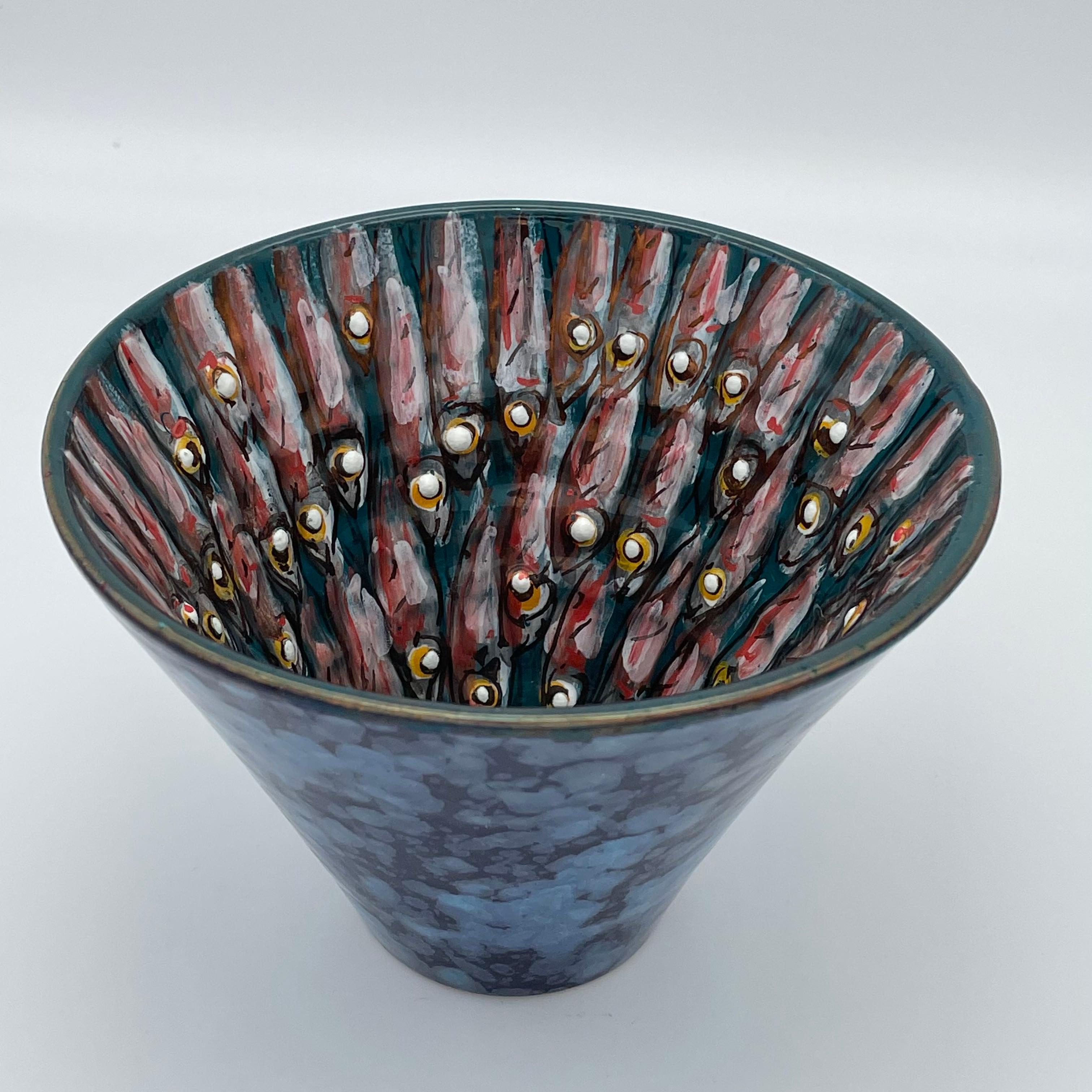 Small conical jar, 2021, full-fire reduction faience earthenware 15 cm diameter x 10 cm height , hand painted unique piece.


Bottega Vignoli is a brand of artistic ceramics based in Faenza, one of the most representative ceramic production