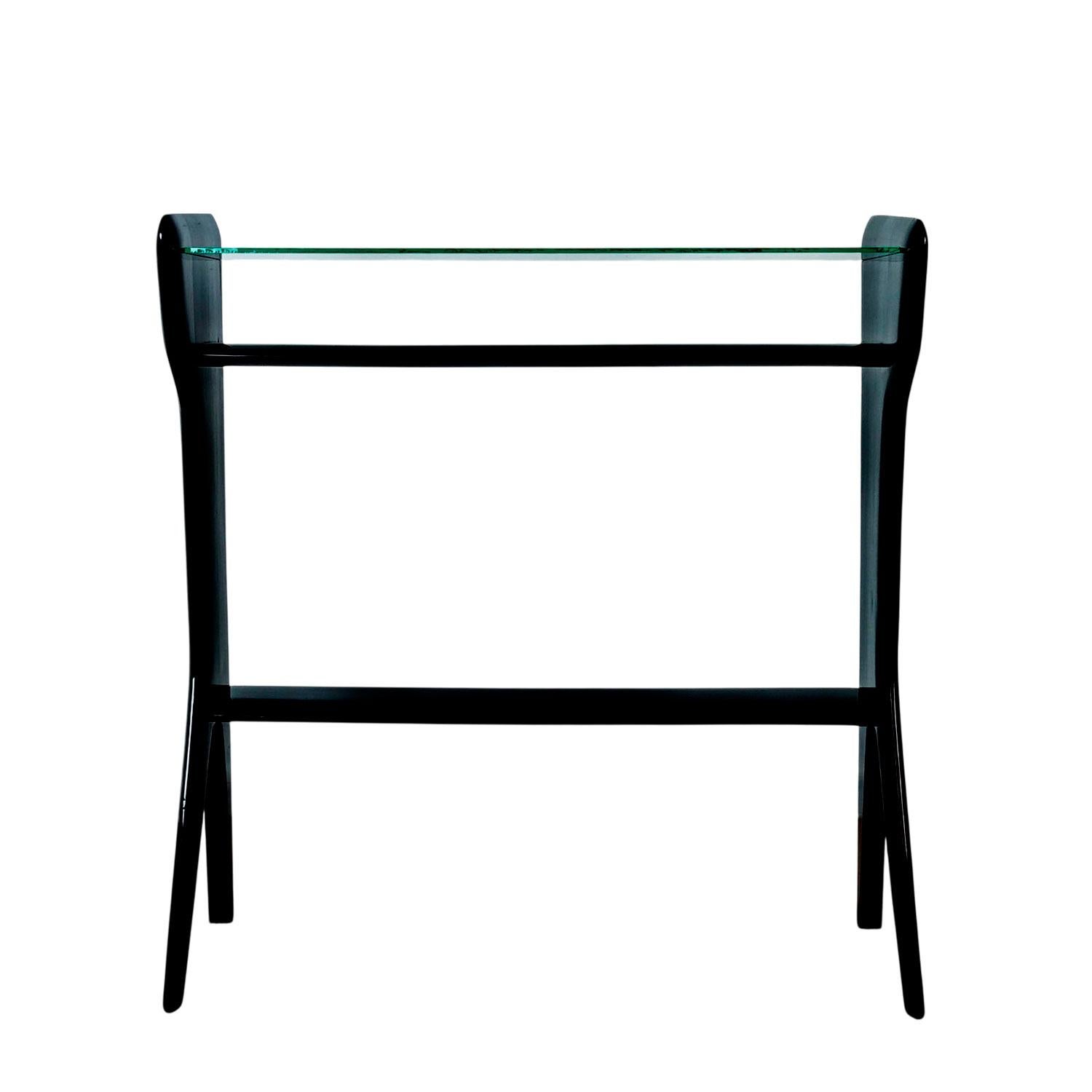 Small, fully removable console in dark stained mahogany with glass on top. French polish.

Italy 1950

Dimensions
cm 84,5 x 27 x 89 – 84 glass shelf/73 middle shelf/30 bottom shelf
inches 32.27 x 10.63 x 35.04 – 33.07 glass shelf/28.74 middle
