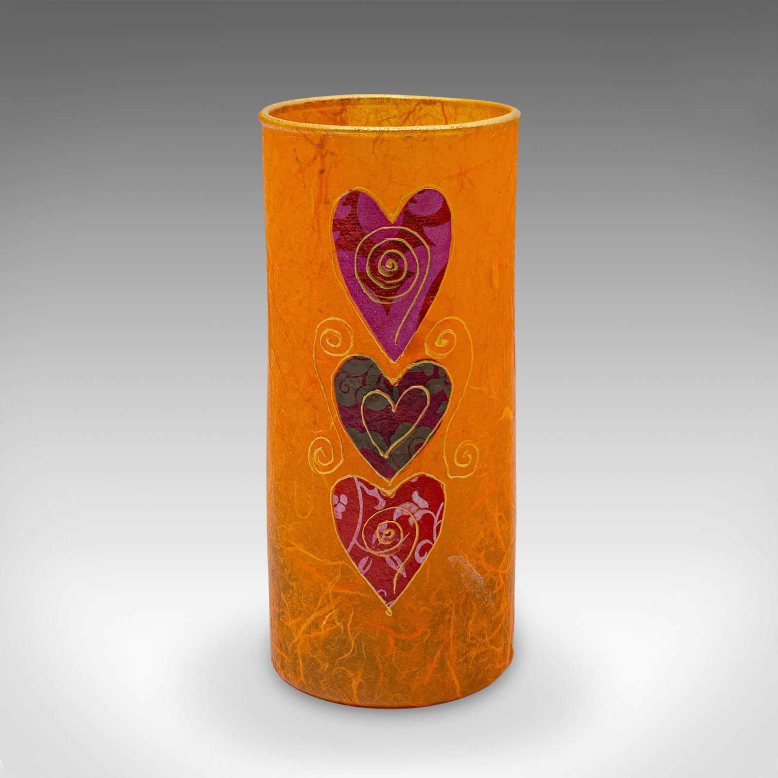This is a small contemporary decorative vase. An English, straw silk art glass flower sleeve by Margaret Johnson.

Unusual and interesting technique matched with great colour
Displaying a desirable, contemporary appearance and in good