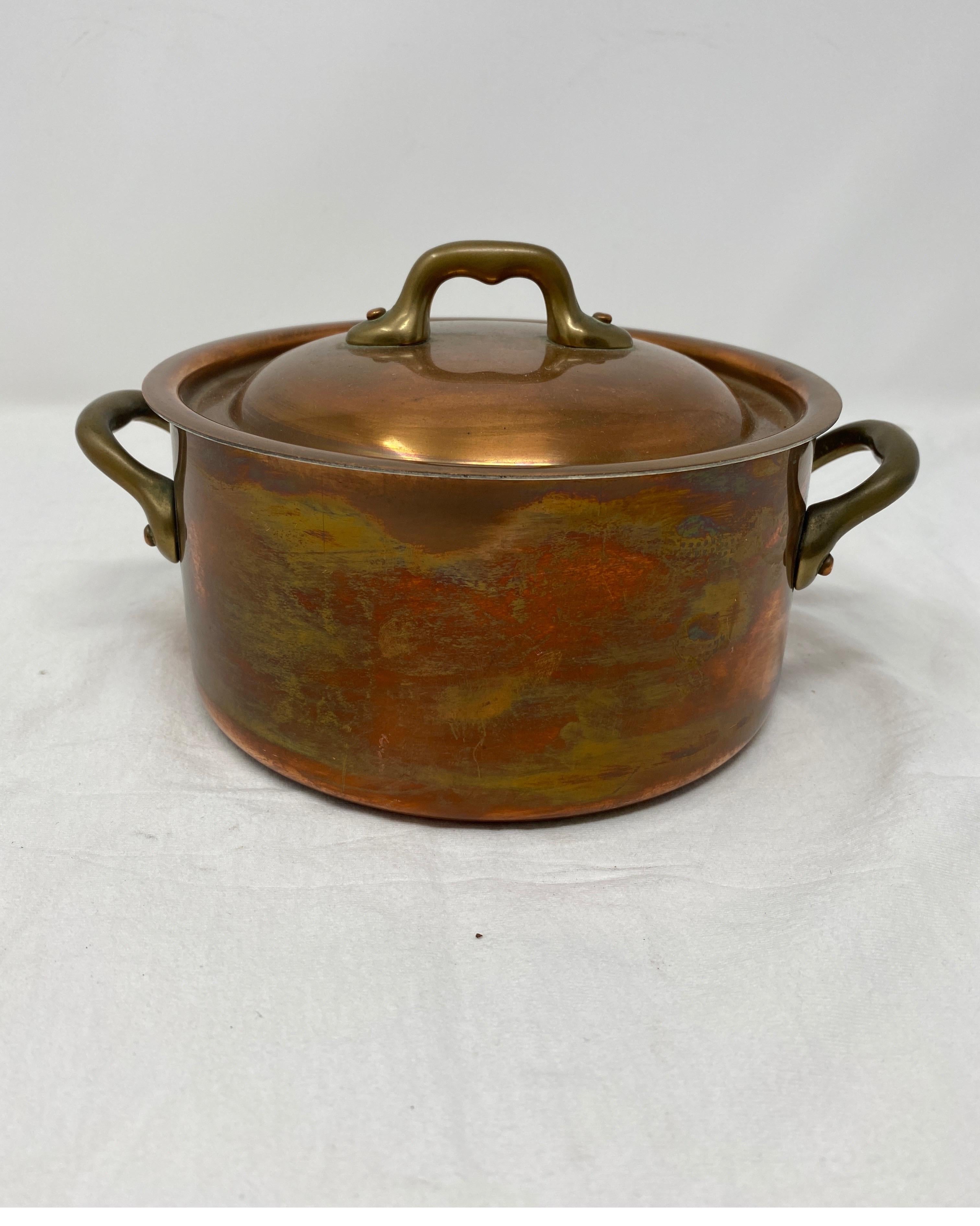 Small copper pot with brass handles and lid
Measures: 6 1/2” diameter x 3 1/4” height
4 1/2” height overall x 8 1/2” diameter overall. 

      