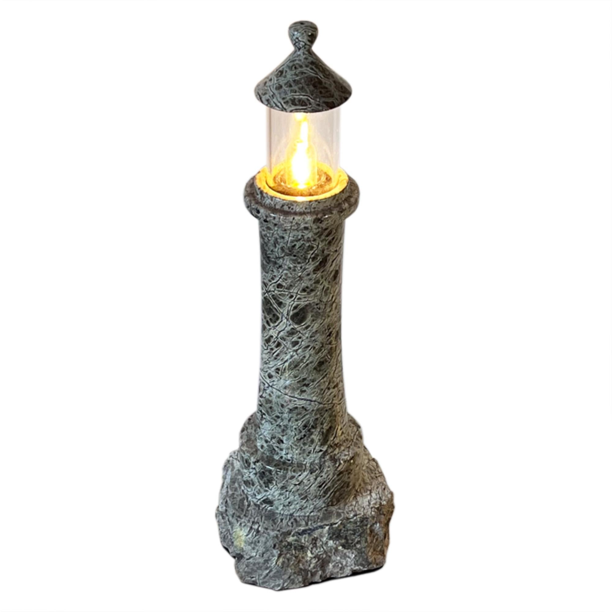 This table lamp is an iconic Cornish antiques. Hand crafted from the local Serpentine stone near The Lizard - the extraction of this rock is now very limited and only small items are now made. 

We currently have three of these table lamps for sale