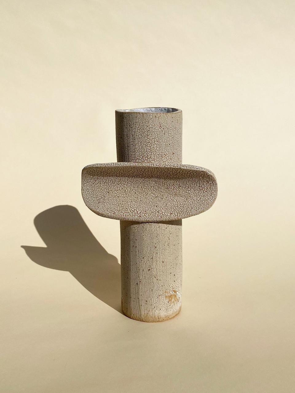 Large Crackled Totem by Olivia Cognet
Materials: Clay
Dimensions: h Around 35 cm

Available in different sizes, sets available.

Totem
Vases, lamps and sculptures with graphic forms, made from clay that gives them a rough look..

Each of