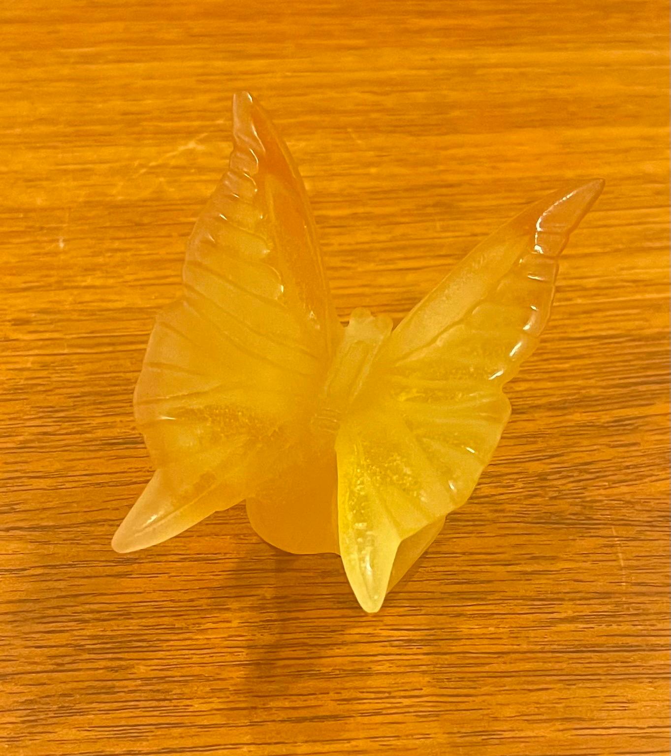Small crystal butterfly sculpture / paperweight by Daum of France, circa 1970s. The etched signature reads 