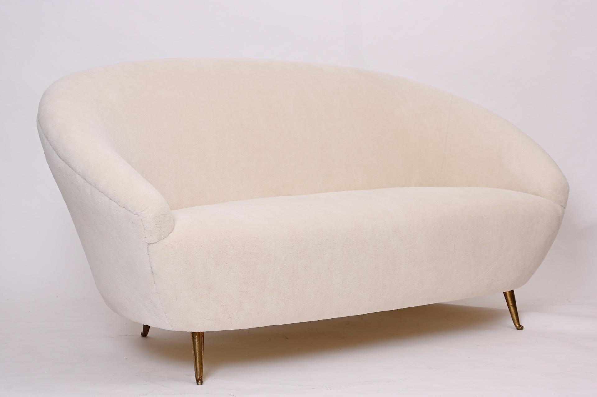 Original 1950s curved sofa by Isa Bergamo from 1950s, Italy.
Style of Ico Parisi or Munari. Similar to Gio Ponti ISA sofas.

 Re upholstered in an off-white/cream alpaca wool teddy velvet... 

Lovely proportions. And very comfortable!