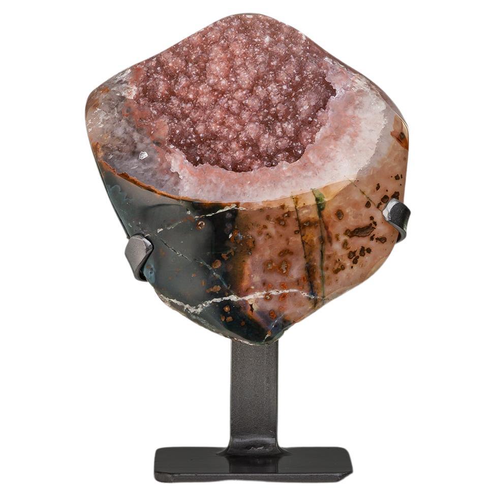 Small cut agatised geode with cotton candy interior For Sale