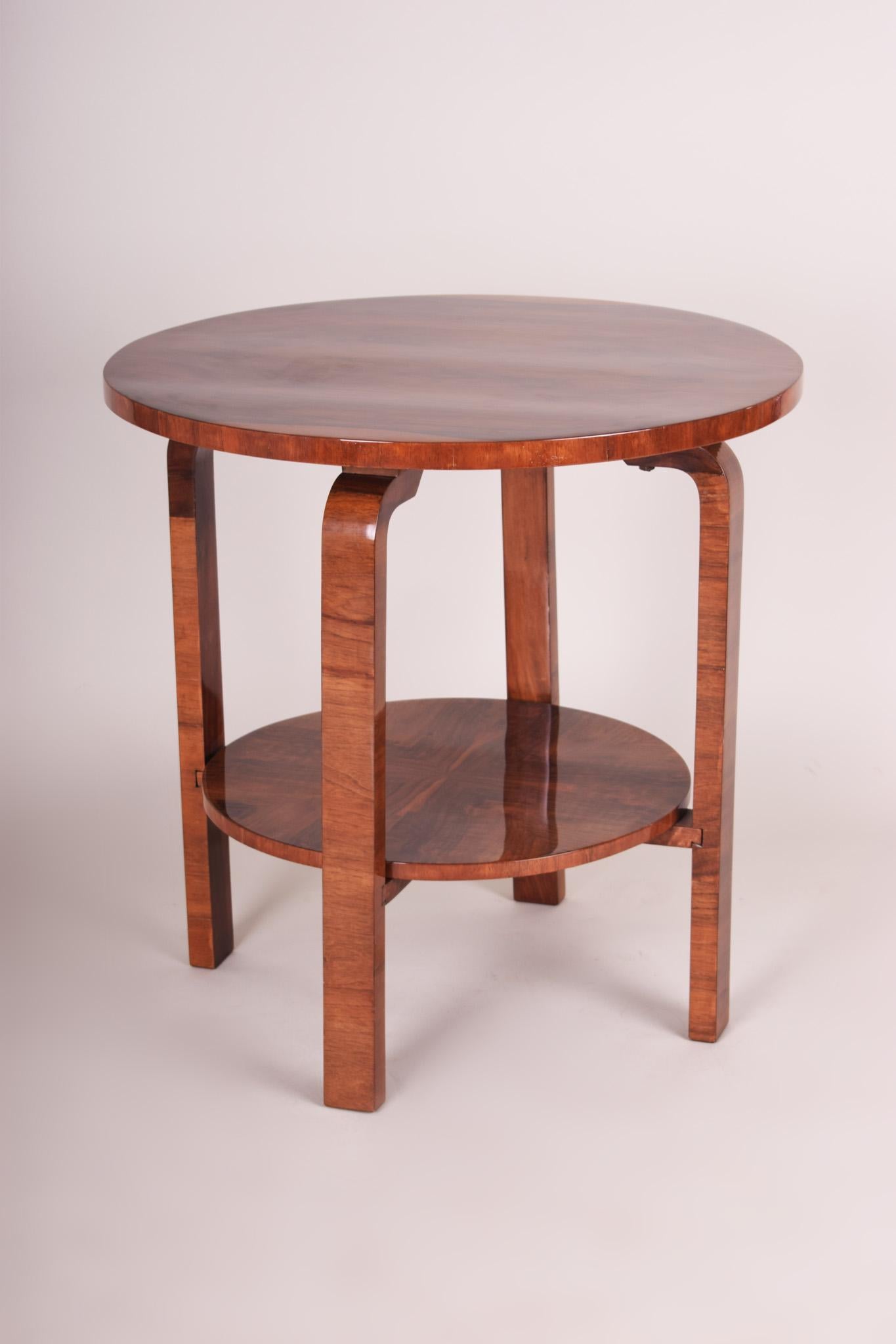 Art Deco table, Czechoslovak.
Completely restored. 
Material: Walnut.