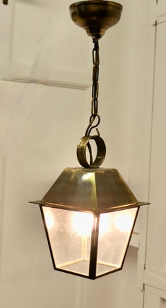 Small Dainty Brass Pendant Lantern  This is a dainty Lantern it has 4 glazed sid