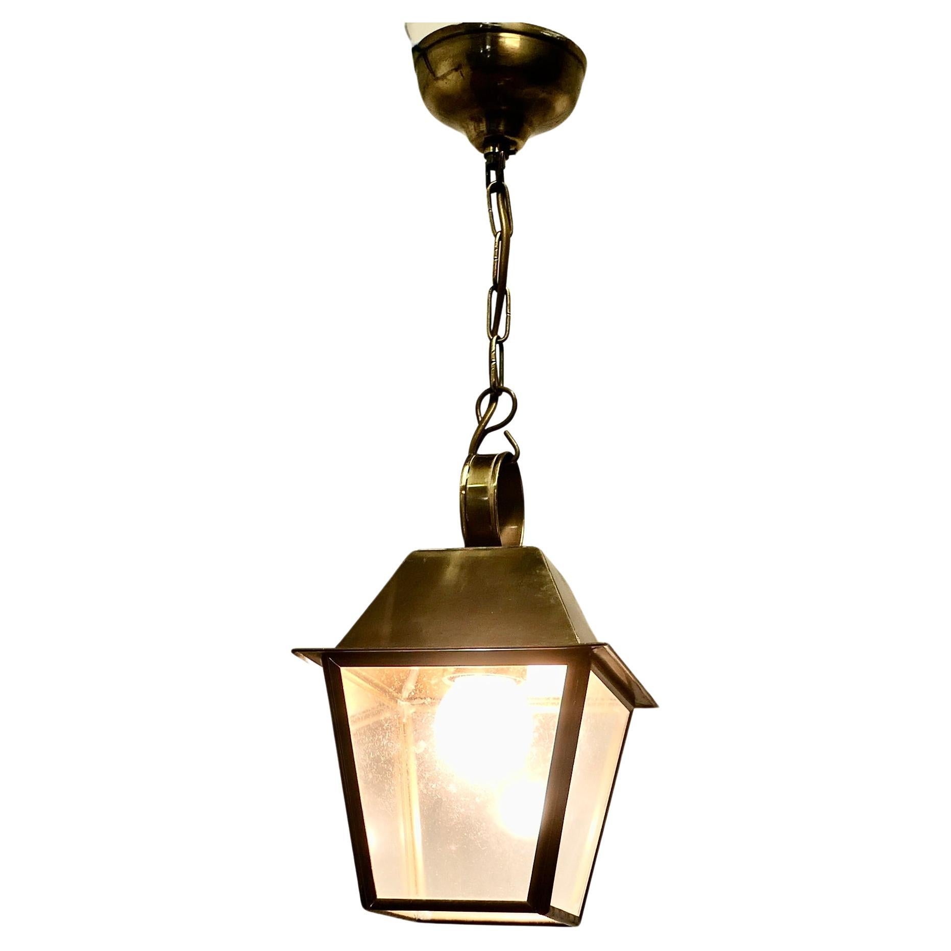 Small Dainty Brass Pendant Lantern  This is a dainty Lantern it has 4 glazed sid For Sale