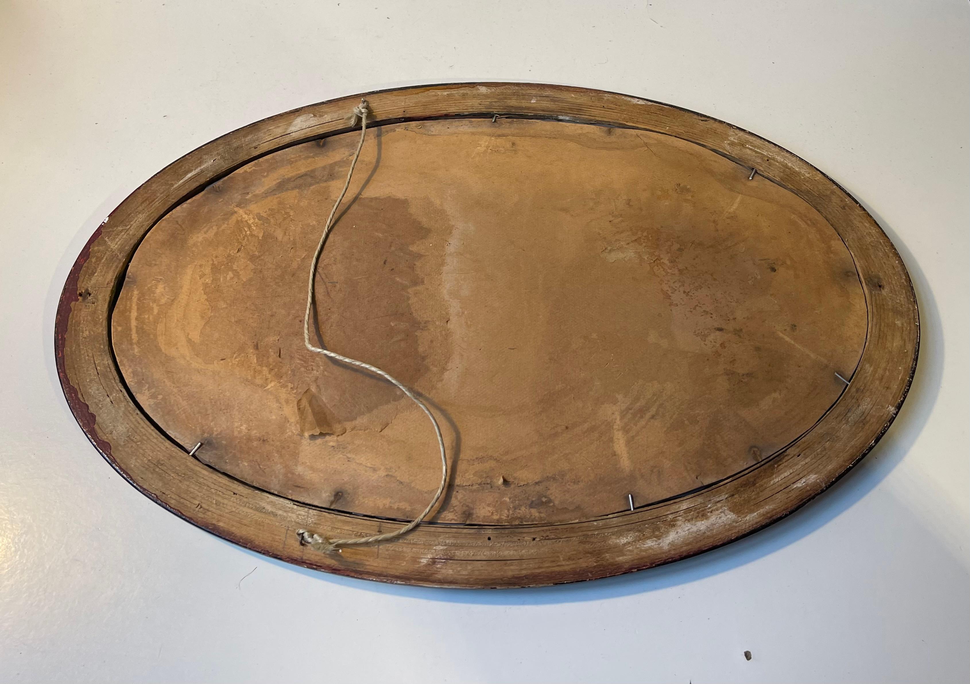 Early 20th Century Small Danish Antique Oval Wall Mirror in Stained Oak, 1920s For Sale