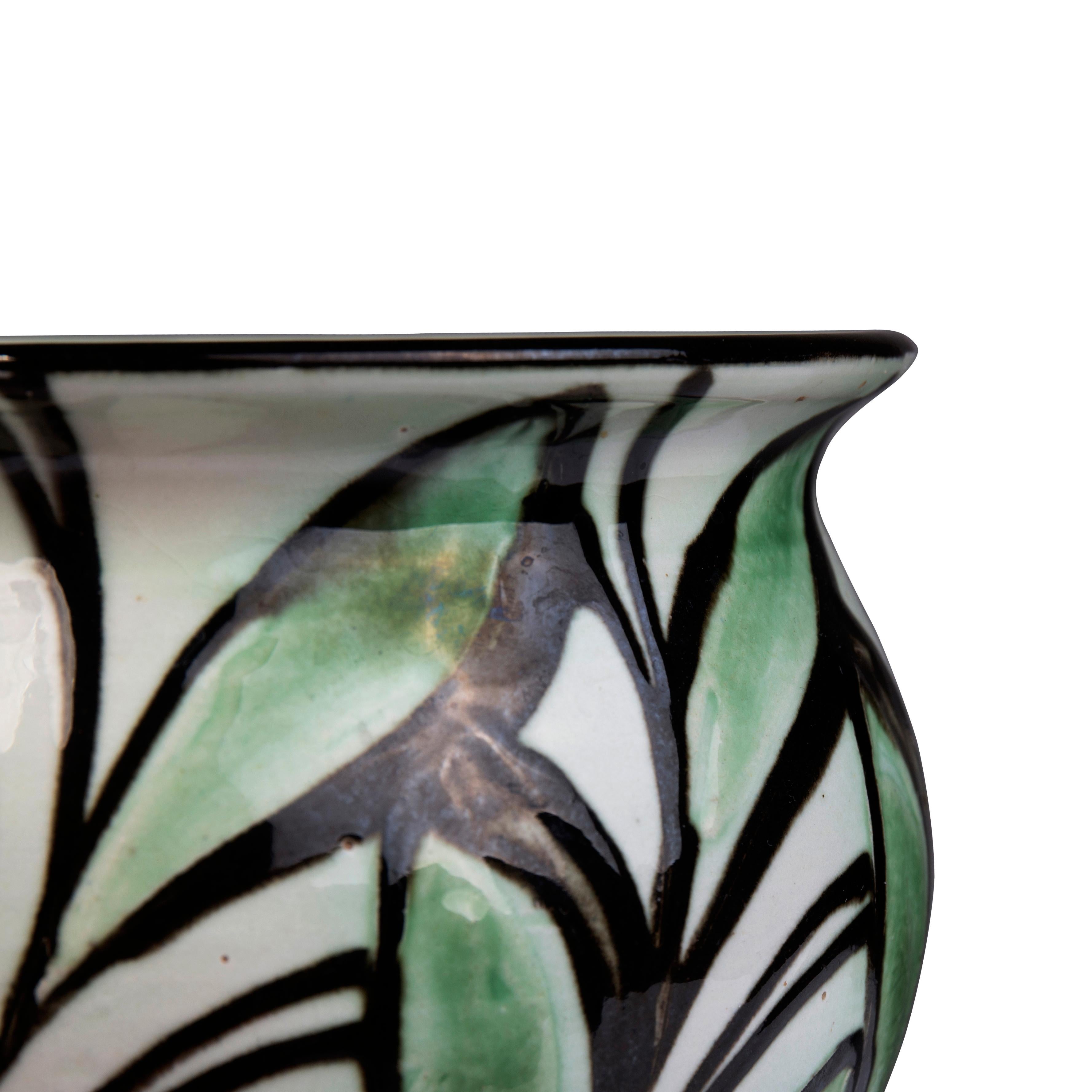 Glazed Small Danish earthenware vase horn-decorated with green leaves on white a base  For Sale