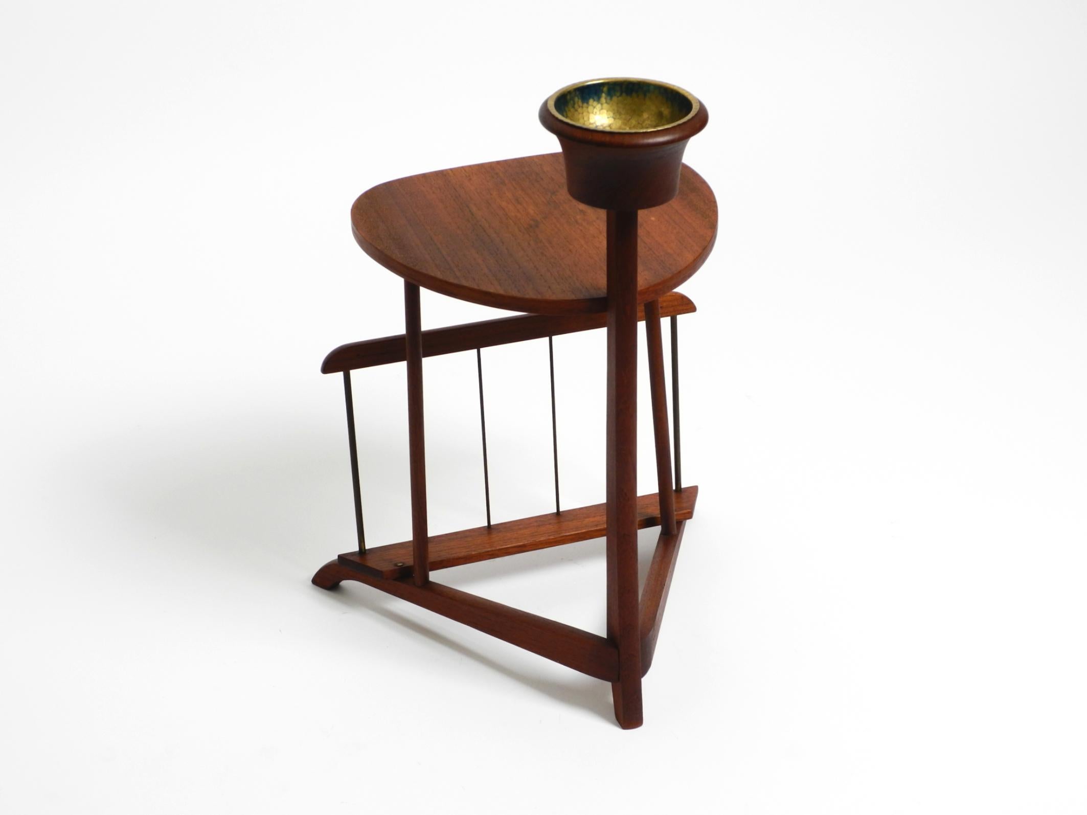 Mid-Century Modern Small Danish Mid Century teak side table with magazine compartment and ashtray