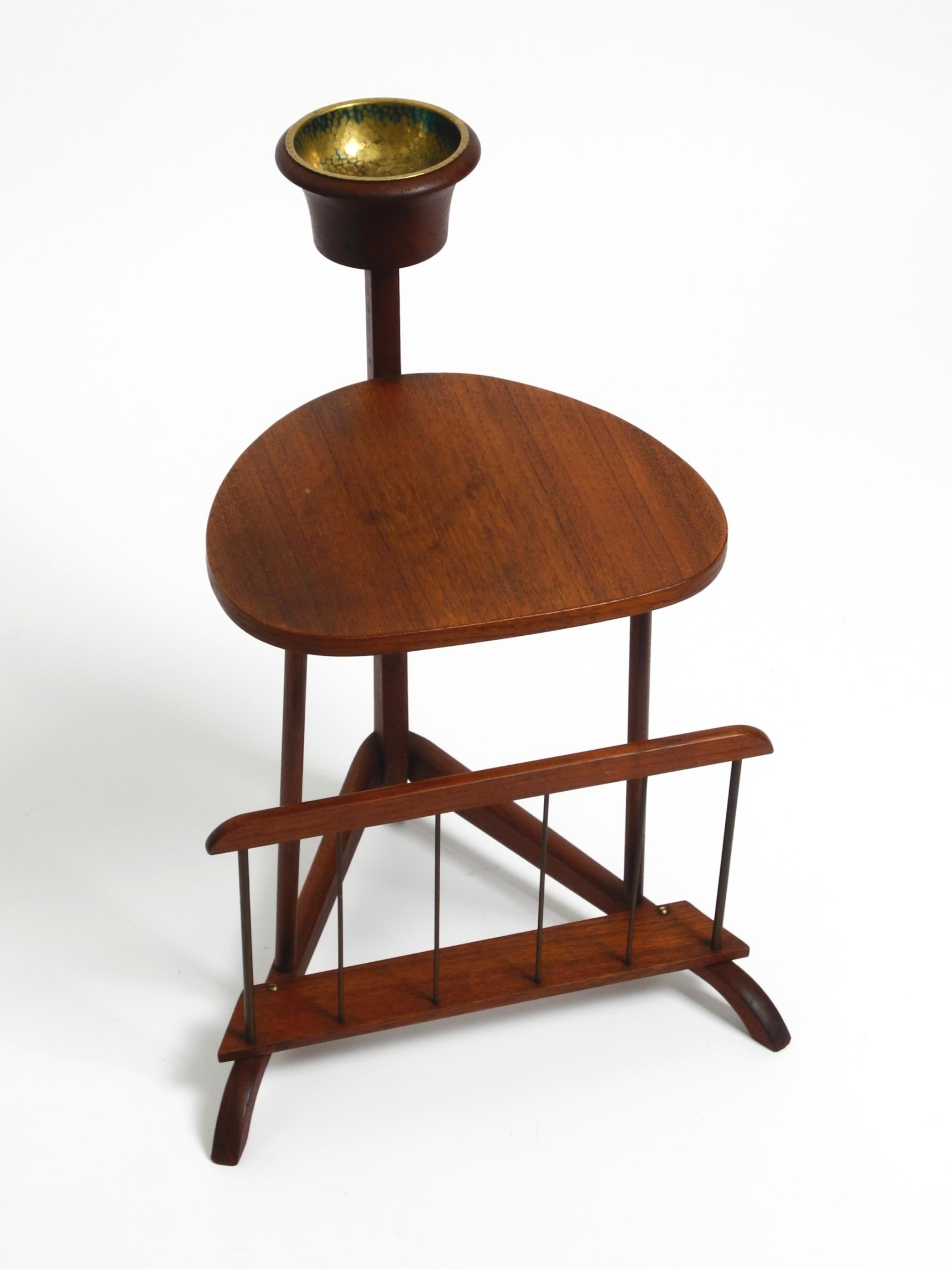 Small Danish Mid Century teak side table with magazine compartment and ashtray In Good Condition In München, DE