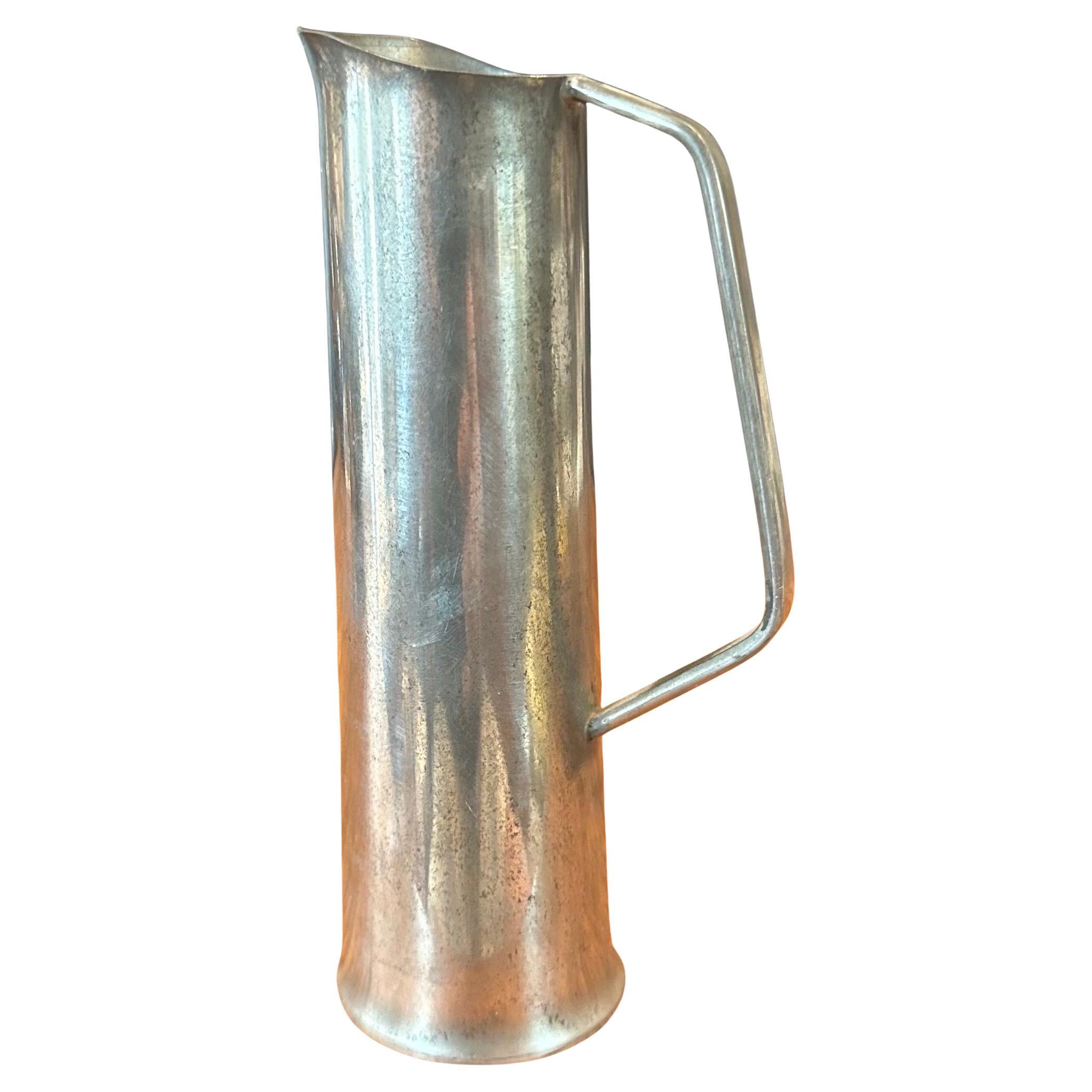 A nice small Danish modern pewter ewer / pitcher, circa 1960s. The piece is in good vintage condition with a nice patina and measures 3.25