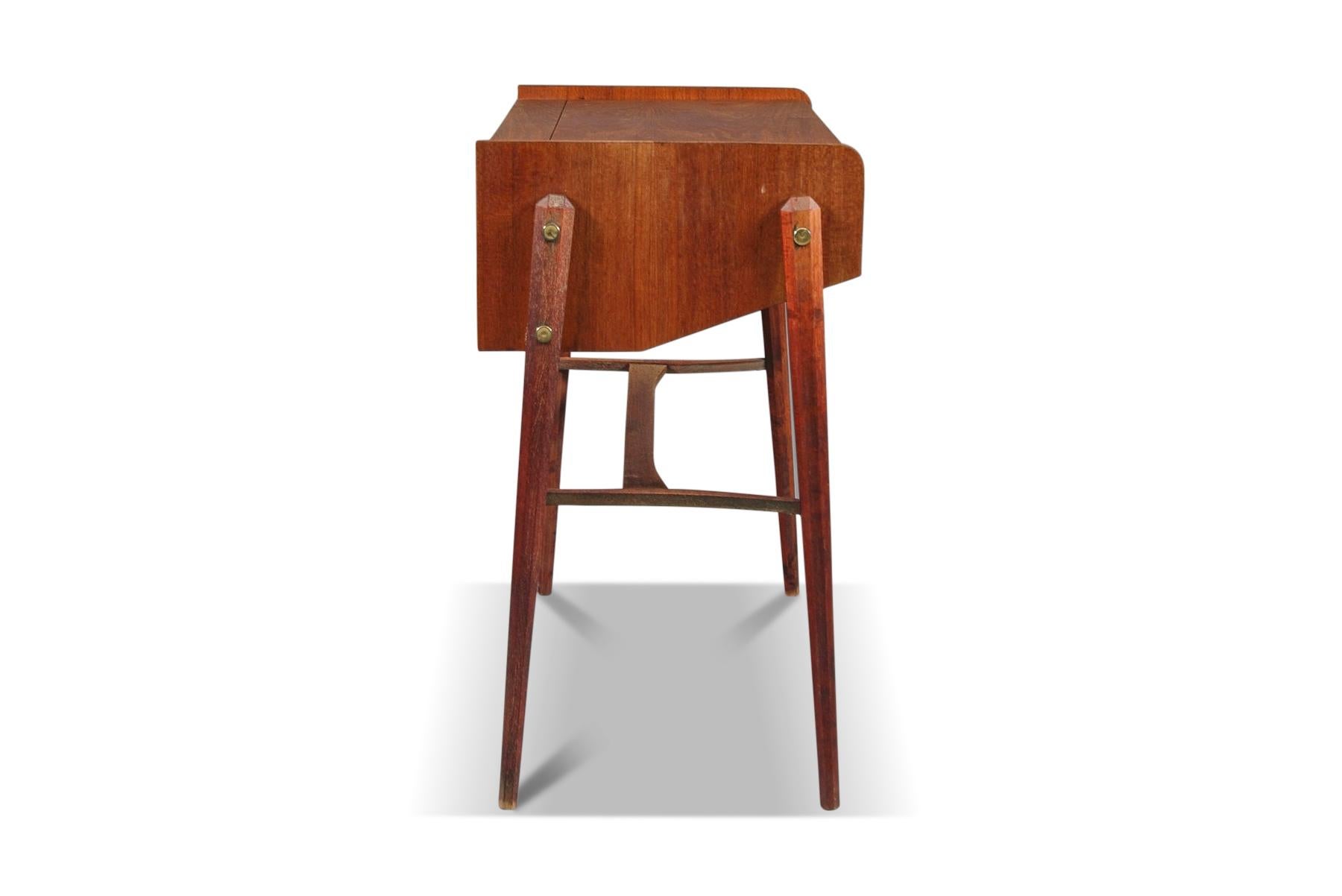 Origin: Denmark
Designer: Unknown
Manufacturer: Unknown
Era: 1950s
Materials: Teak
Measurements: Inquire for measurements

Condition: In good original condition with vintage wear. Price includes refinishing / restoration.