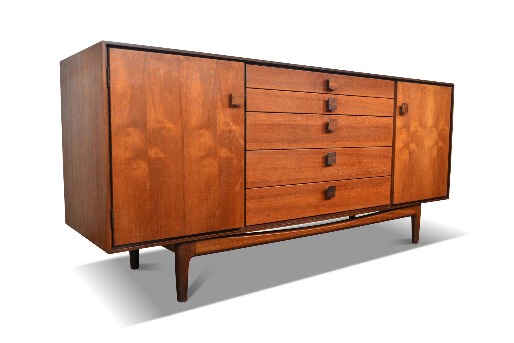 Origin: England
Designer: Ib Kofod Larsen
Manufacturer: G Plan
Era: 1961
Materials: teak, rosewood, Afromosia.
Measurements: 66? wide x 19? deep x 30? tall.

Condition: In excellent original condition with typical wear for its vintage. Price