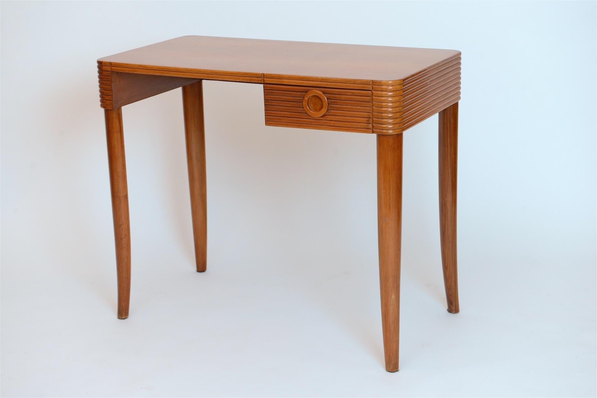 Small desk probably by Paolo Buffa. Italy circa 1950 in cherrywood.

  