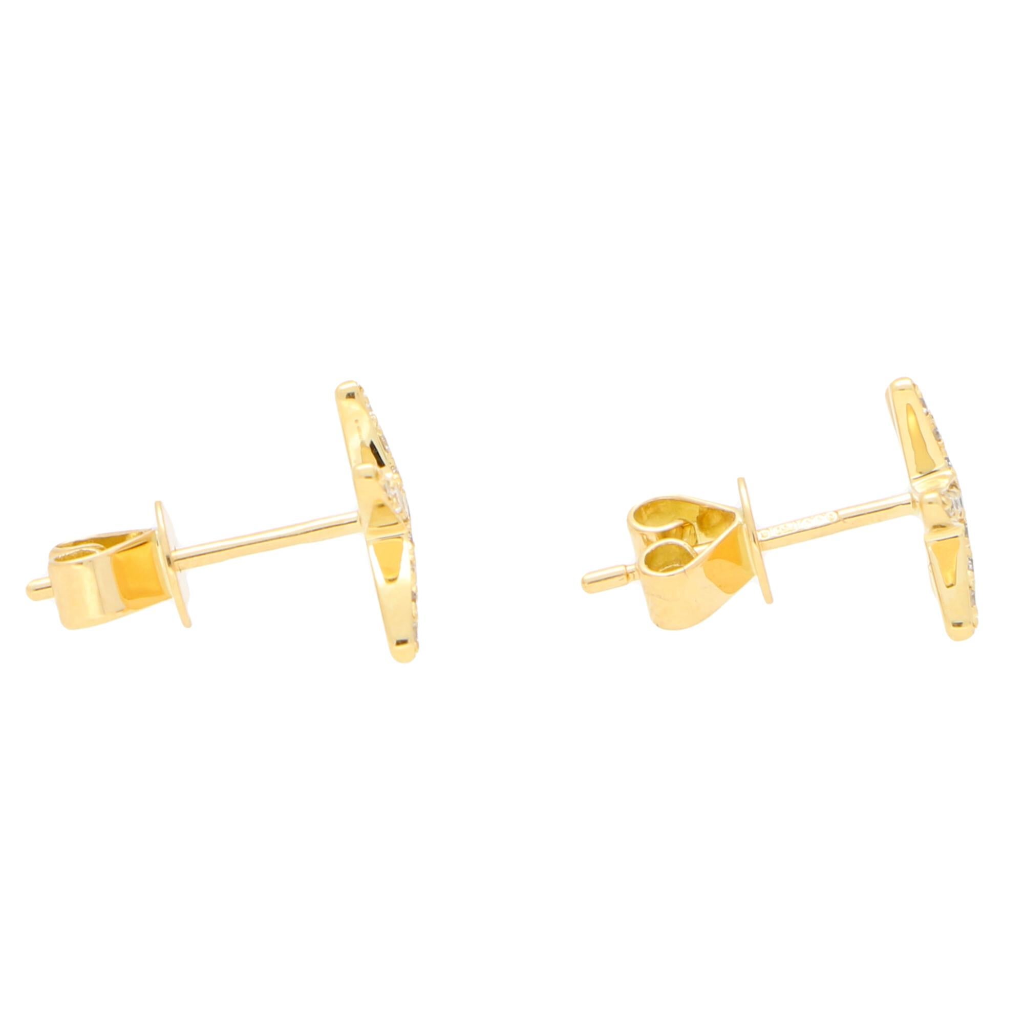 Modern Small Diamond Starfish Stud Earrings Set in 18 Karat Yellow Gold For Sale