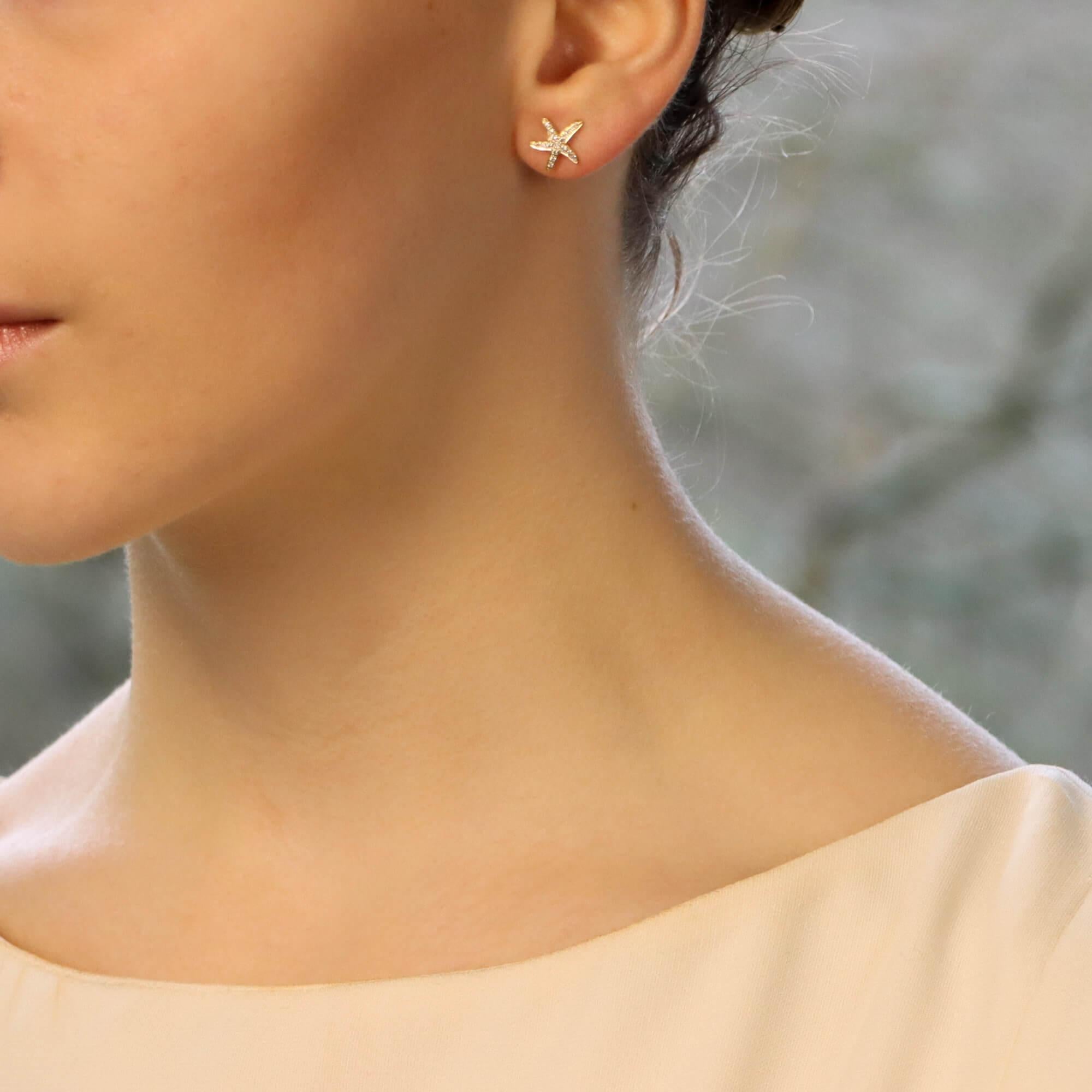 Women's or Men's Small Diamond Starfish Stud Earrings Set in 18 Karat Yellow Gold For Sale