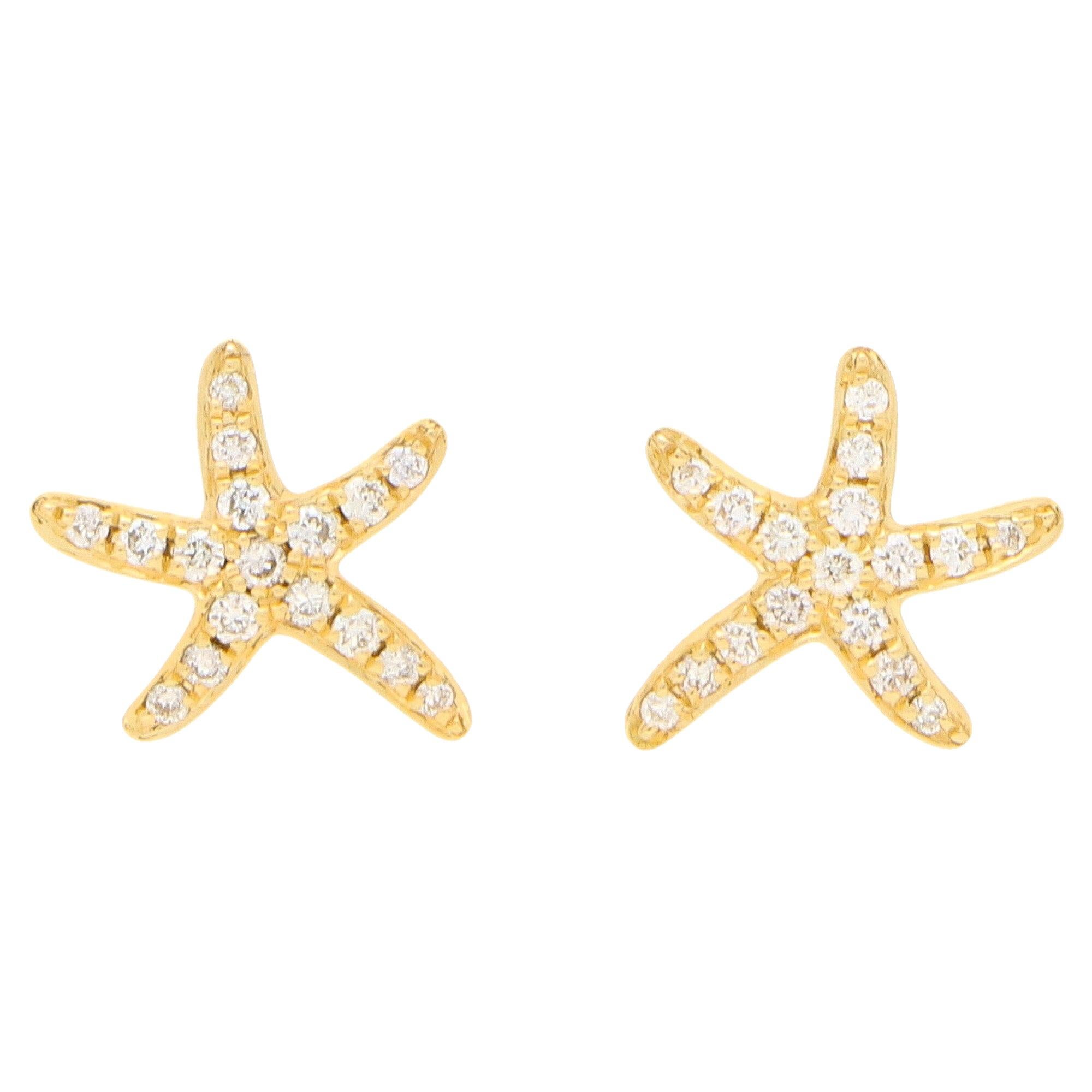 Clous d'oreilles étoile de mer en or jaune 18 carats sertis de petits diamants