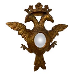 Petit miroir convexe doré à double aigle
