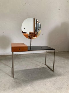 Small dressing table with iconic round mirror, in glass and steel, 1970s
