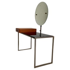 Small dressing table with iconic round mirror, in glass and steel, 1970s