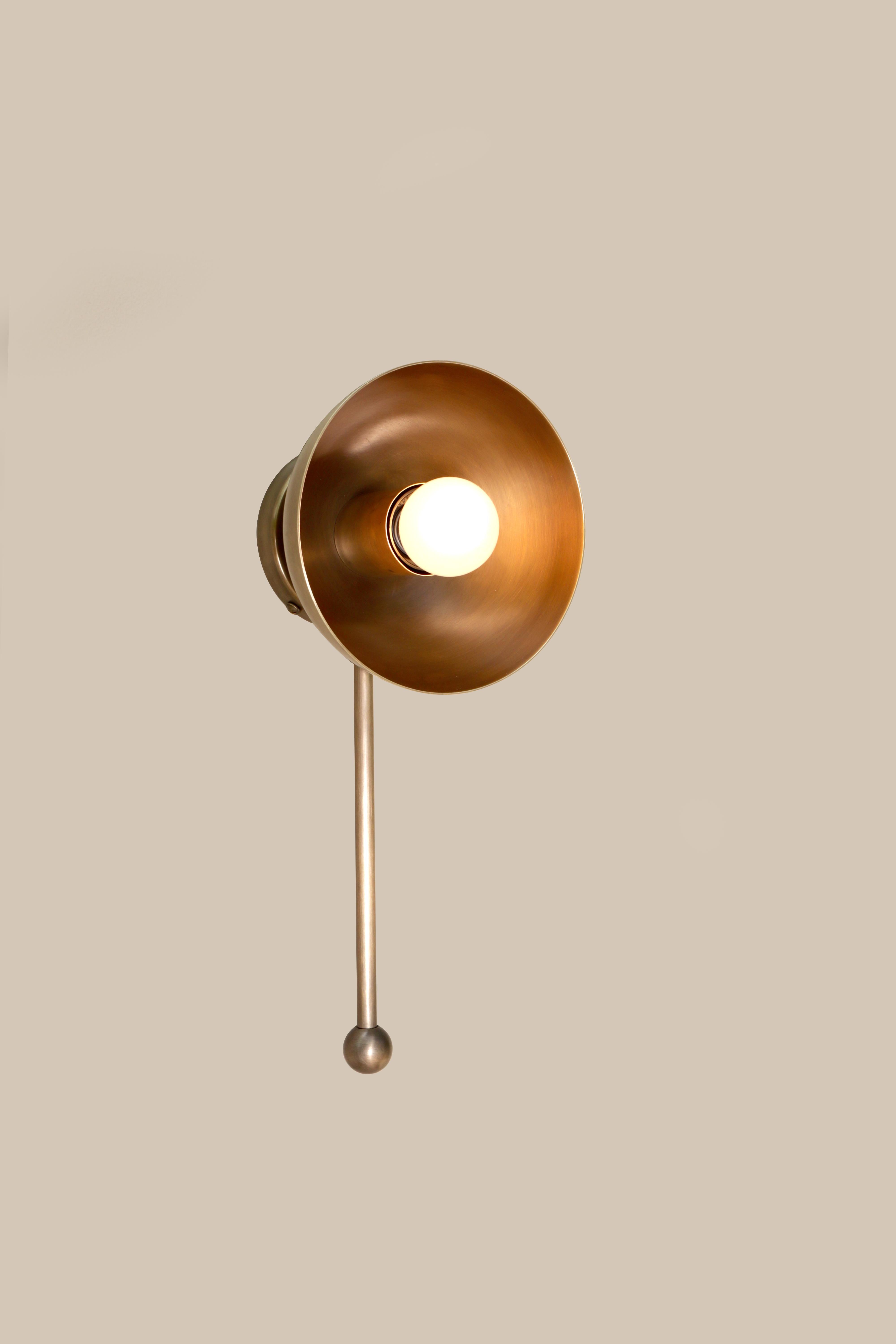 Small Drop Brass Wall Sconce by Lamp Shaper
Dimensions: D 15.5 x W 15.5 x H 30.5 cm.
Materials: Brass.

Different finishes available: raw brass, aged brass, burnt brass and brushed brass Please contact us.

All our lamps can be wired according to
