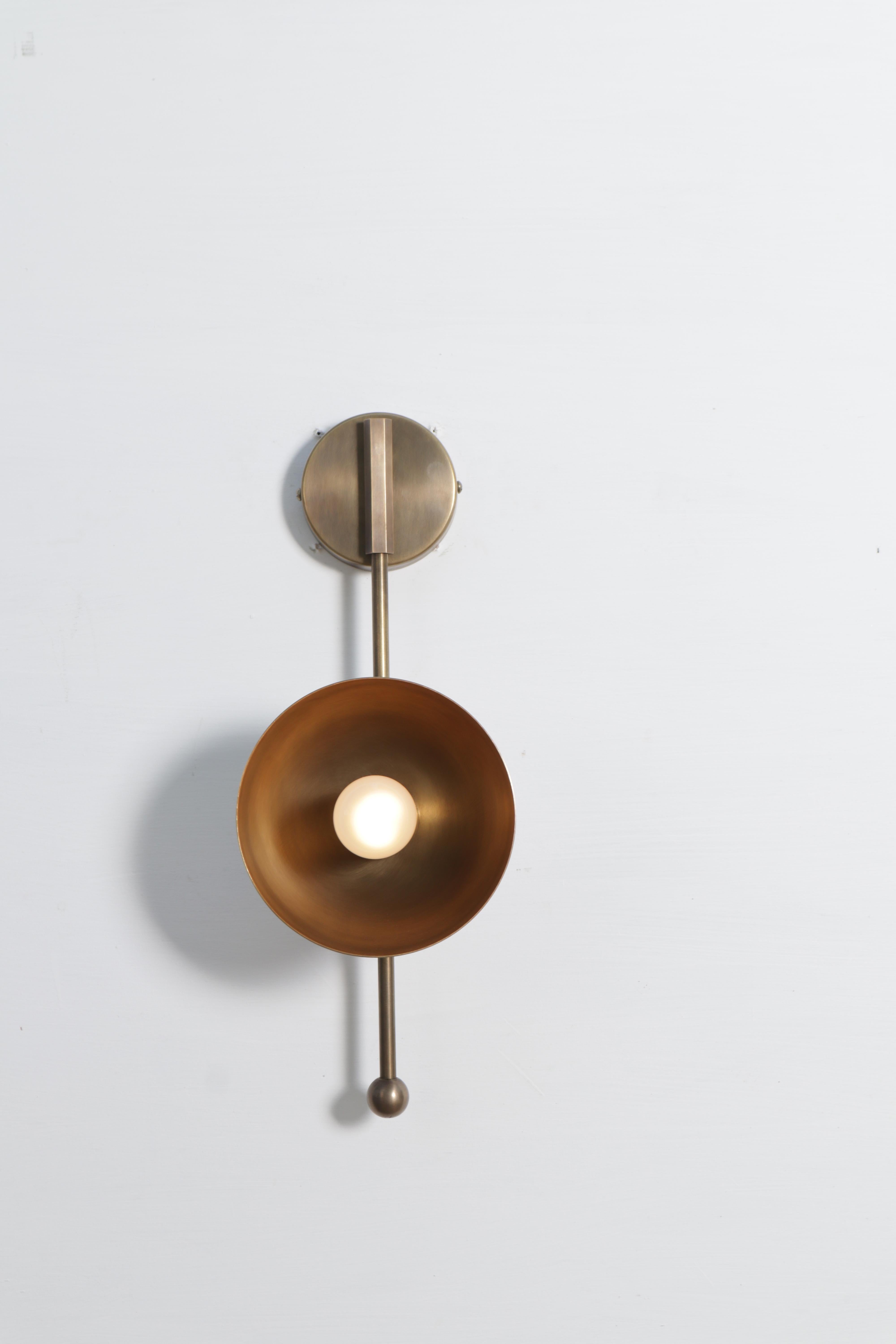 Small Drop Brass Wall Sconce Two by Lamp Shaper
Dimensions: D 15.5 x W 14 x H 41 cm.
Materials: Brass.

Different finishes available: raw brass, aged brass, burnt brass and brushed brass Please contact us.

All our lamps can be wired according to