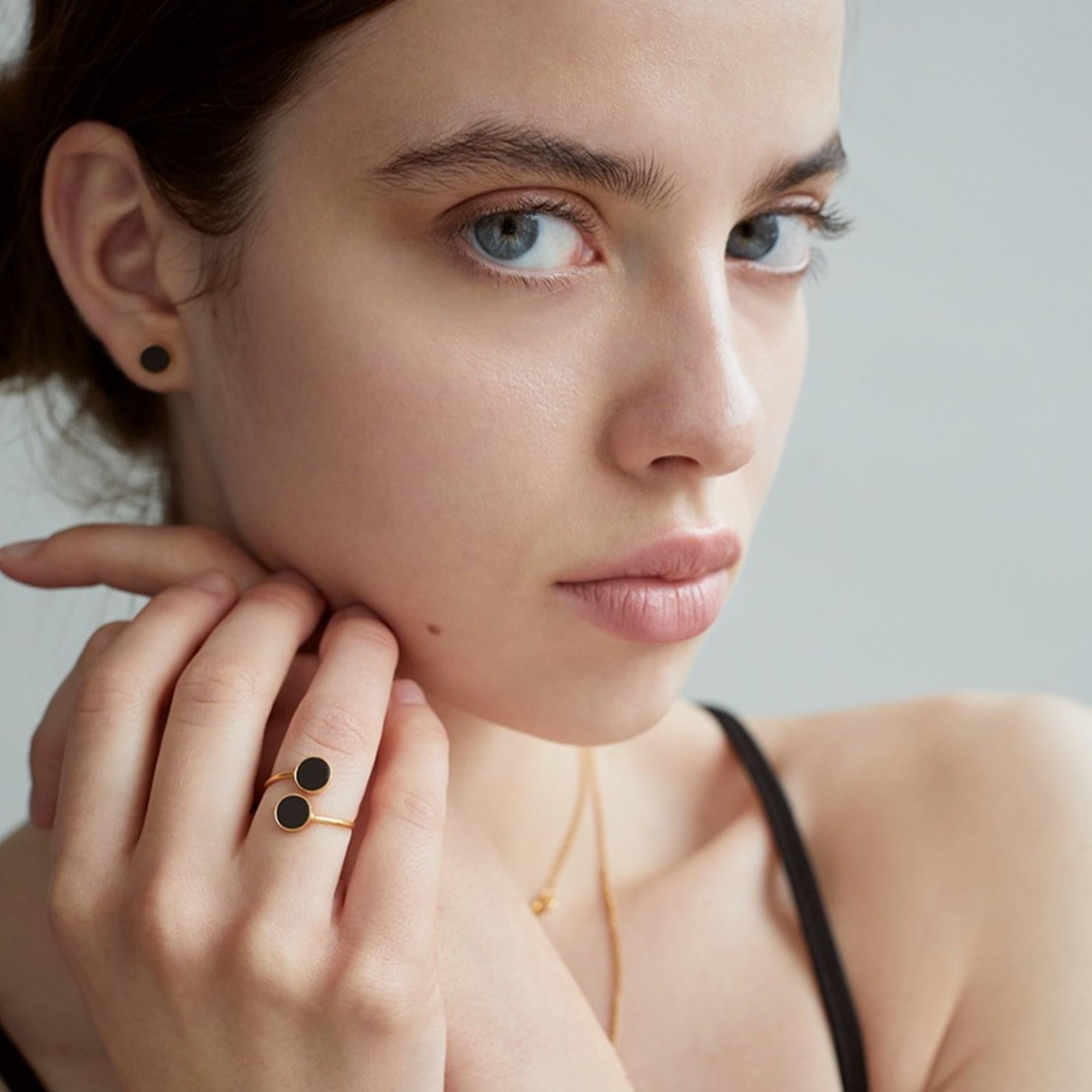 Classic earrings studs with dark, almost black stone are a great addition to a timeless capsule wardrobe. You can wear them with absolutely any outfit. They are not only stylish but also super comfy to wear. 
The stone that adorns the earring is