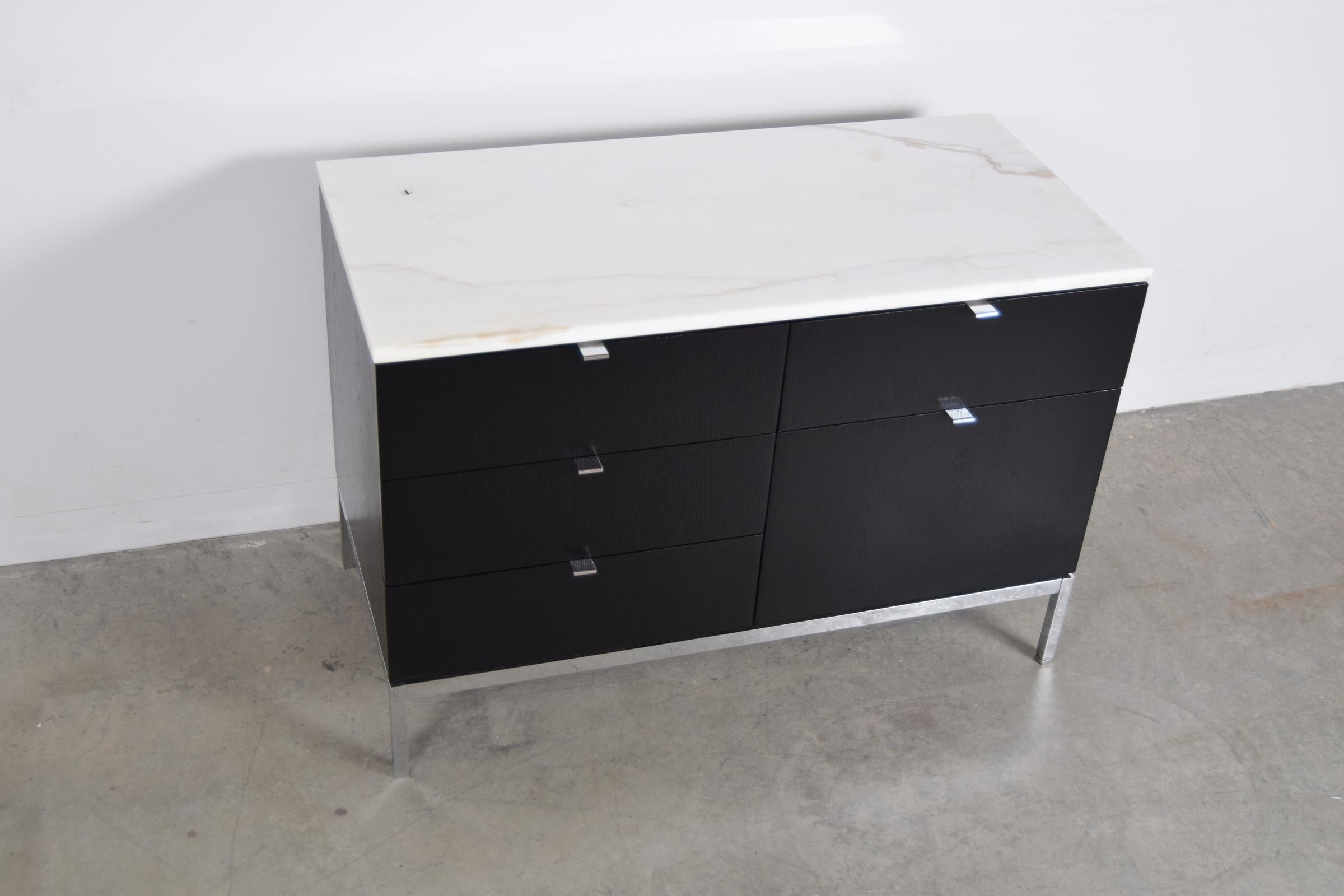 Small ebonized credenza with Calcutta Golden Vein marble top, designed by Florence Knoll, circa 1958. Credenza measures 37 1/4